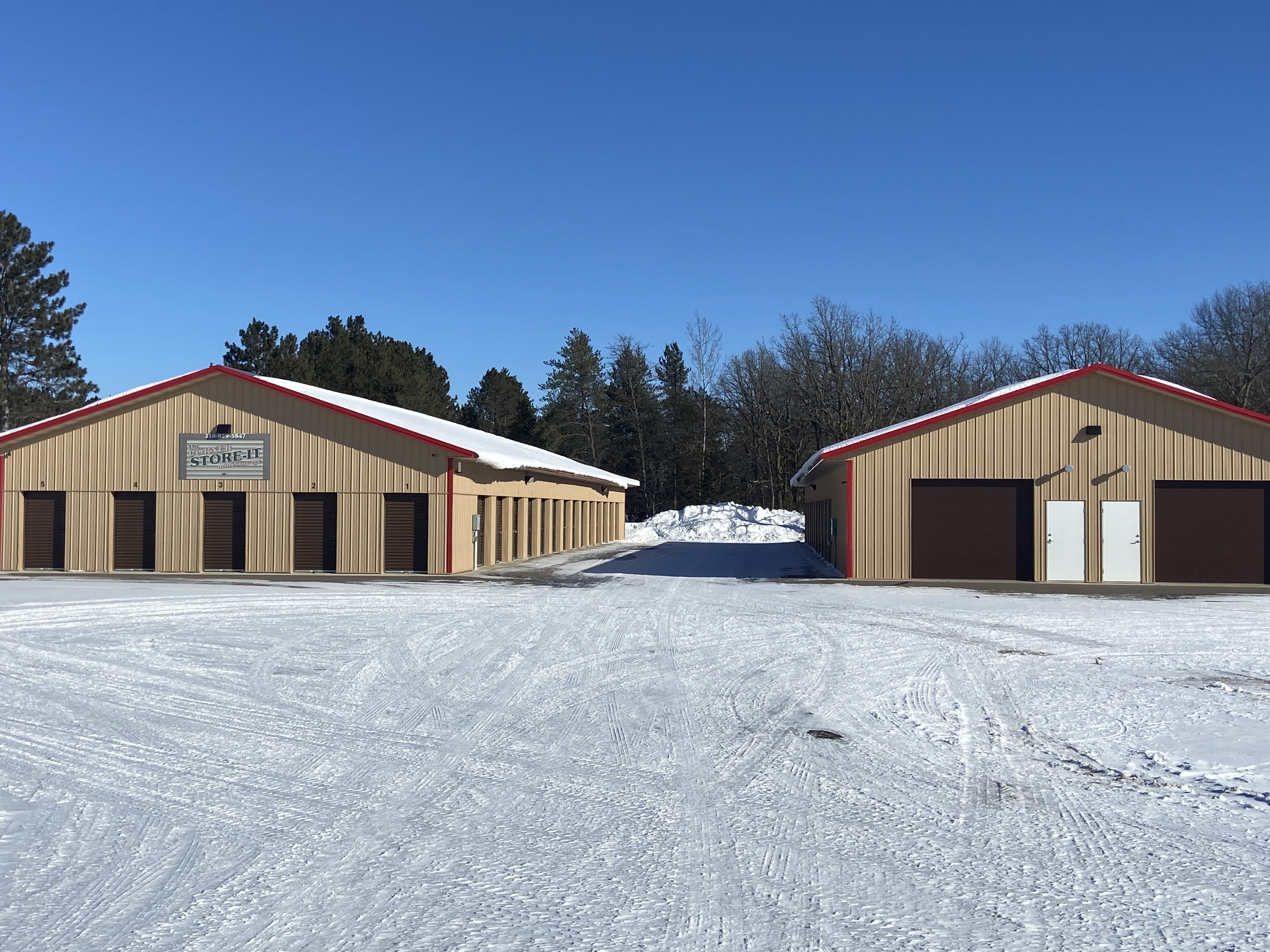 two self storage buildings with drive up access units