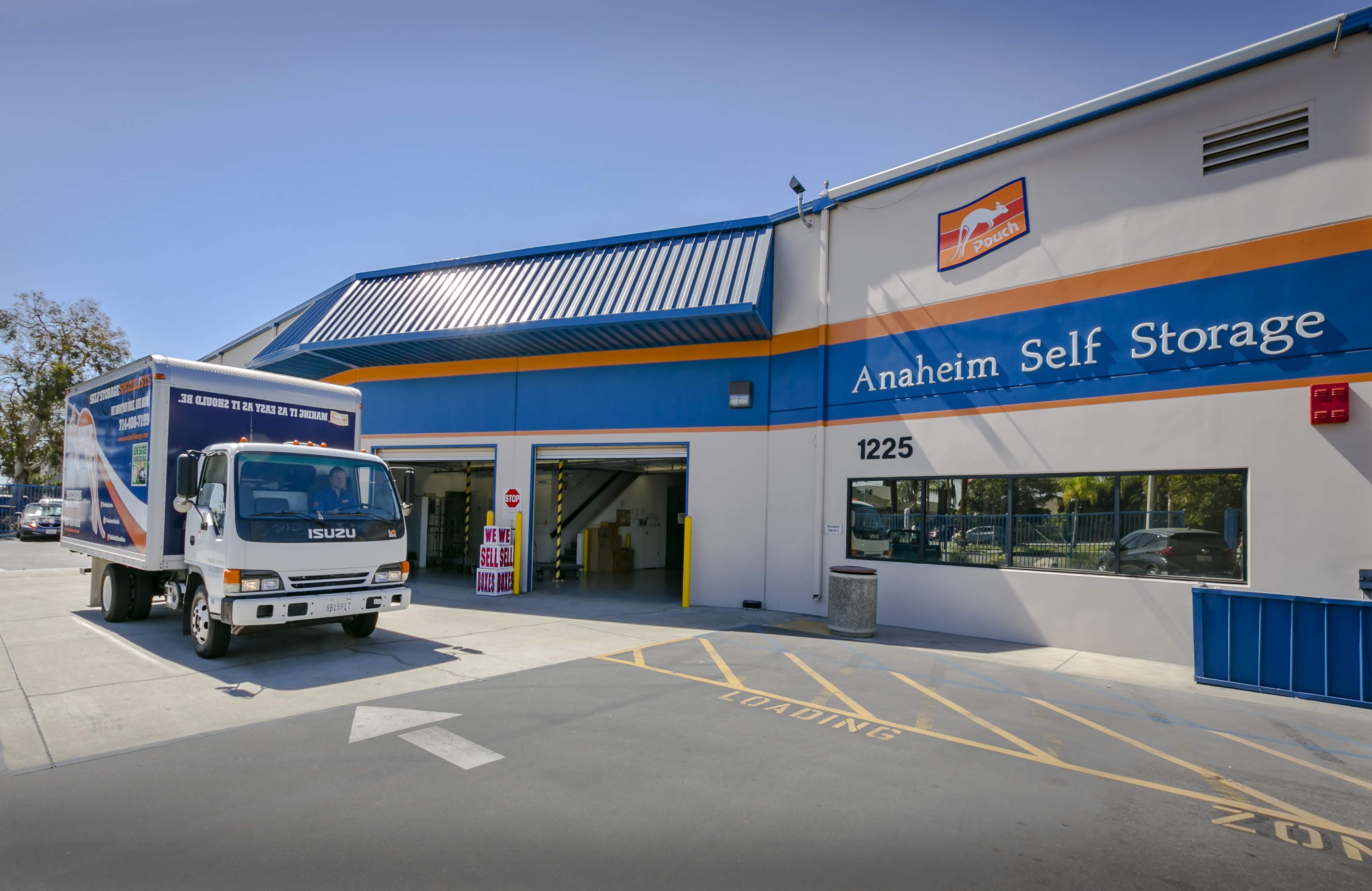 Exterior of Anaheim Self Storage, moving truck parked in front of building