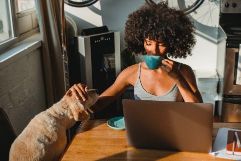 Woman petting a dog