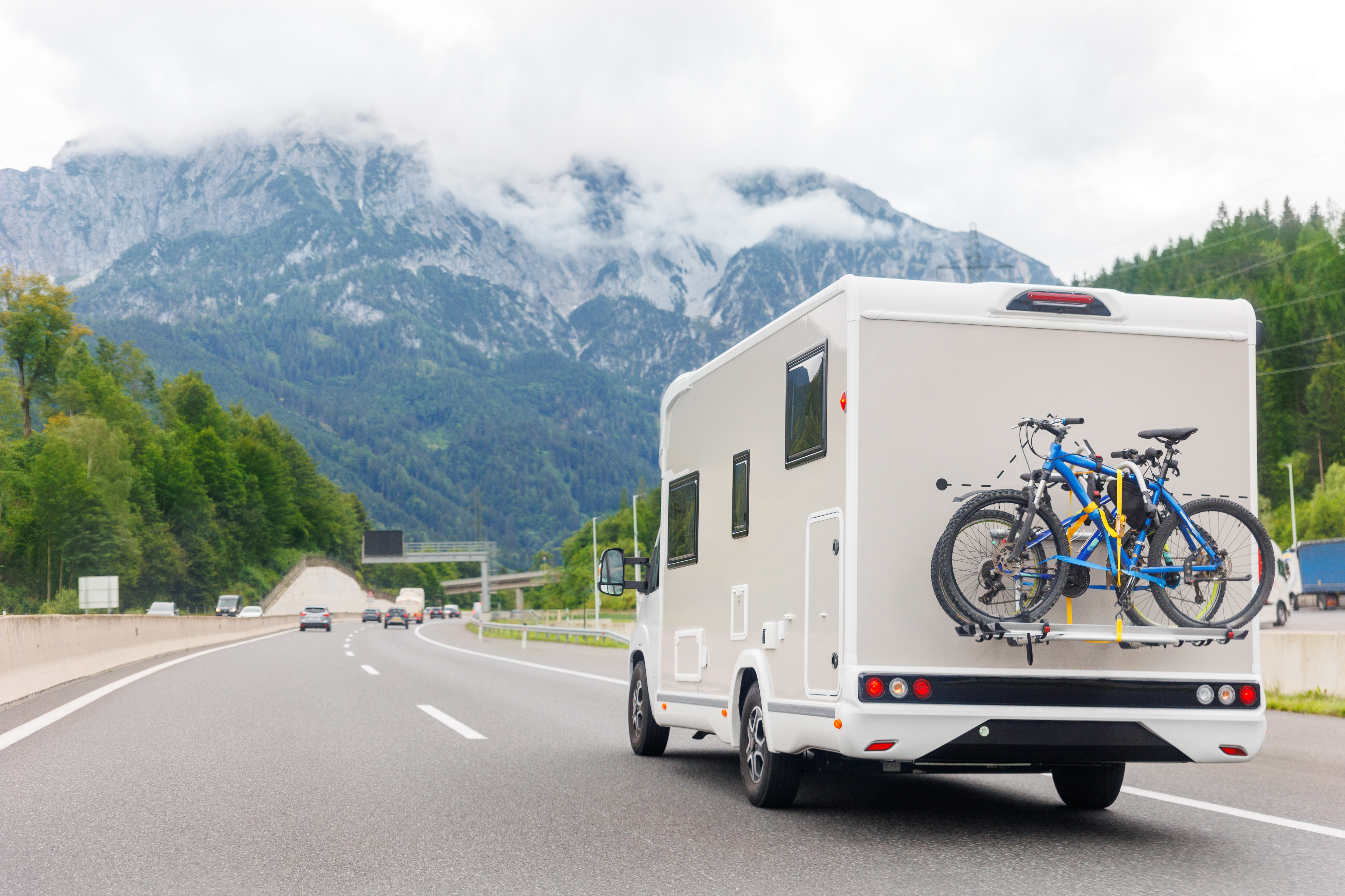 scenic-view-big-modern-white-family-rv-camper-van