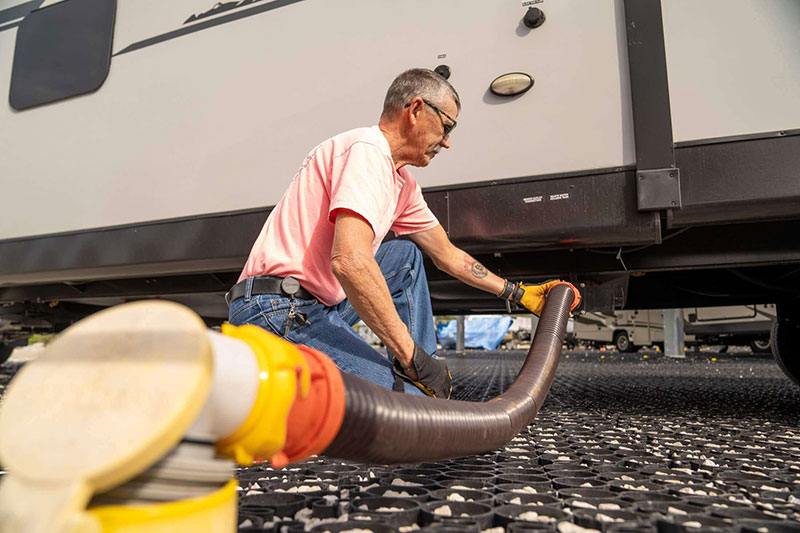 man-using-dump-station-at-storage-facility.jpg