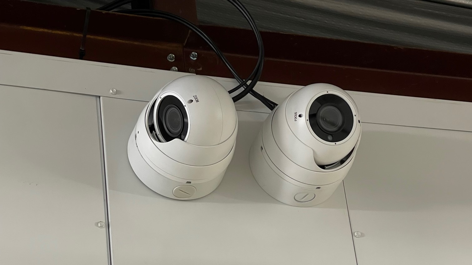 security cameras mounted on a wall