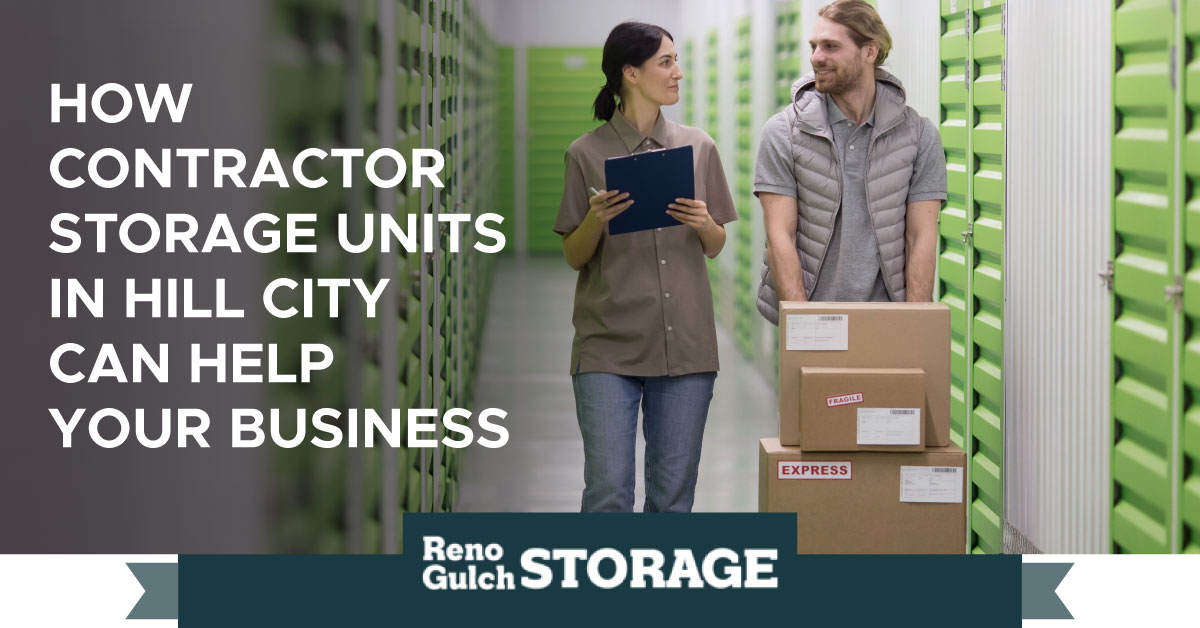 An image of two people transporting boxes down a storage facility hallway. A text banner reads, “How Contractor Storage Units in Hill City Can Help Your Business.”