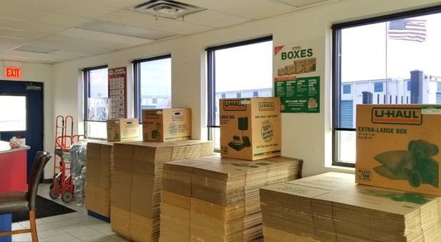 packing boxes stacked in a self storage office