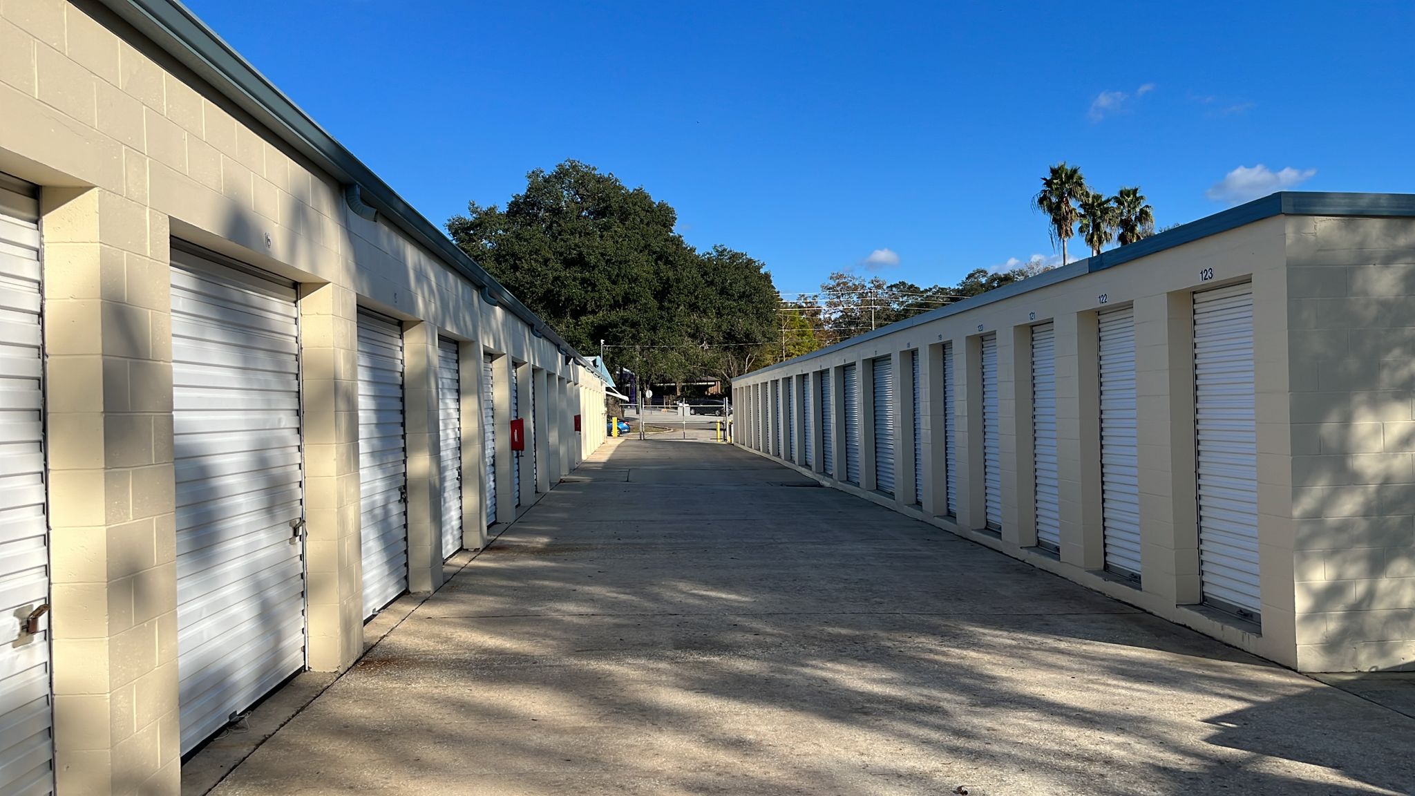 Gated keypad entrance at Ocala Storage Park with access hours 6 AM to 10 PM