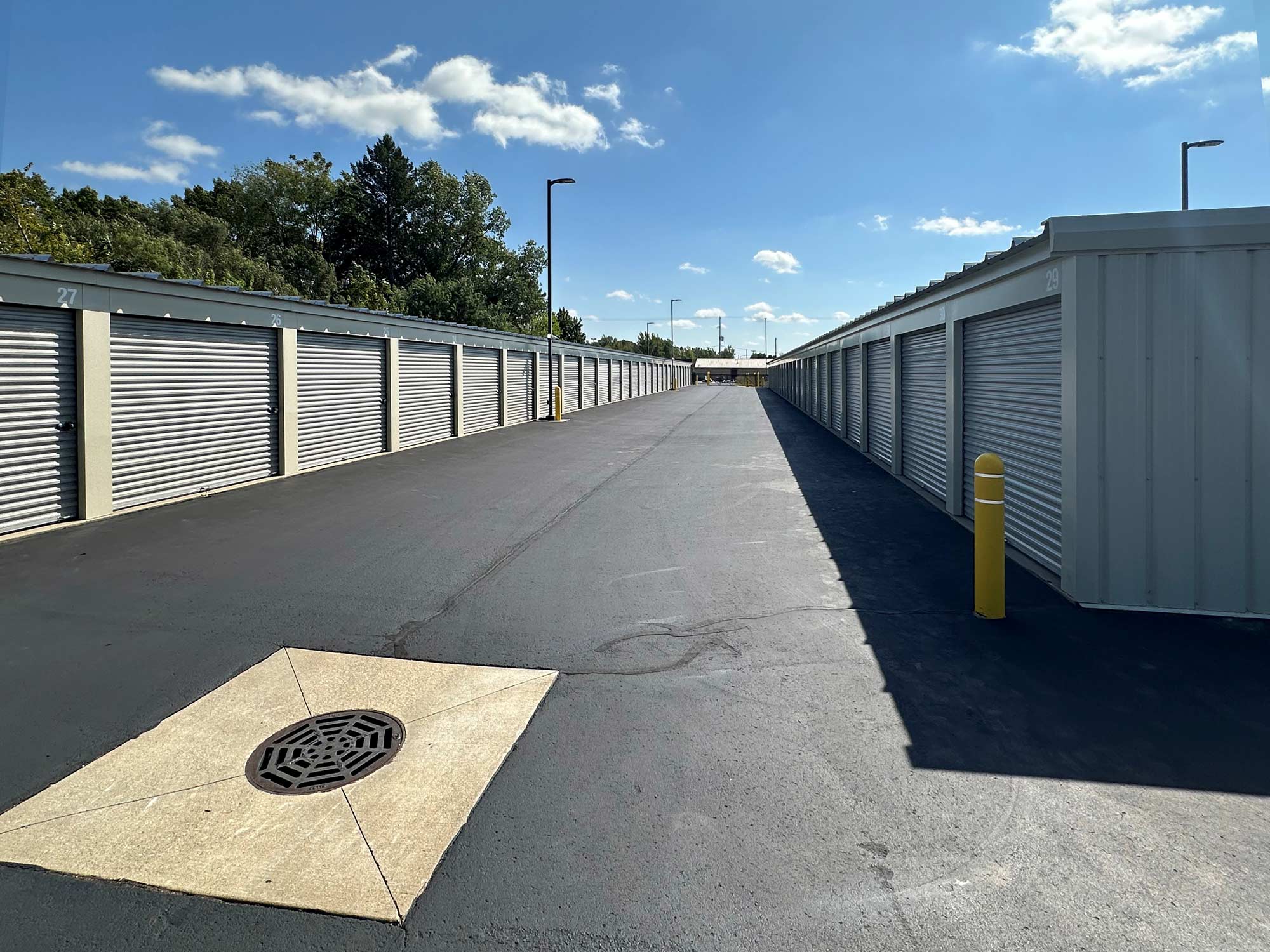 newly sealed blacktop between storage units