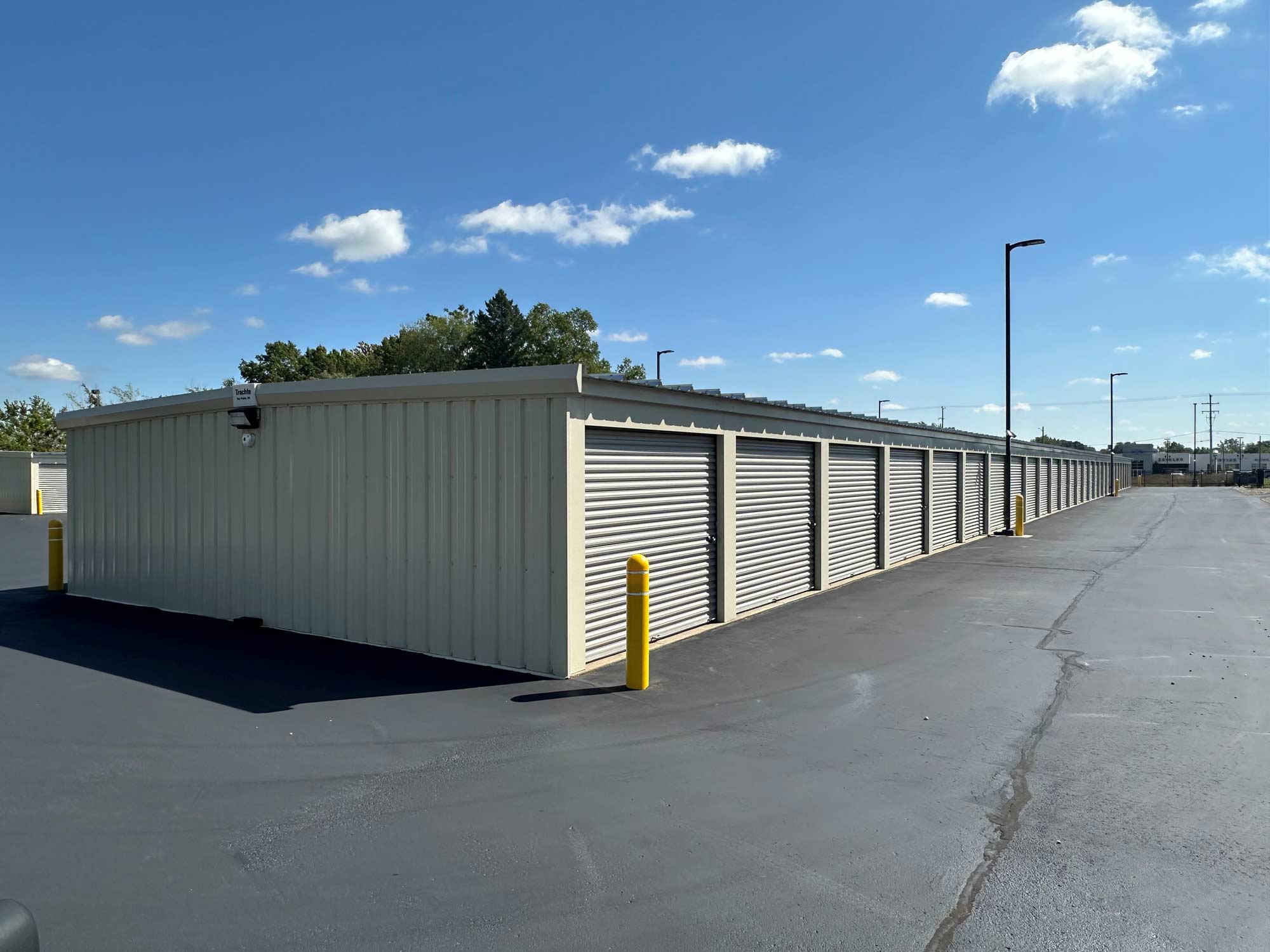 well maintained storage units surrounded by newly sealed blacktop