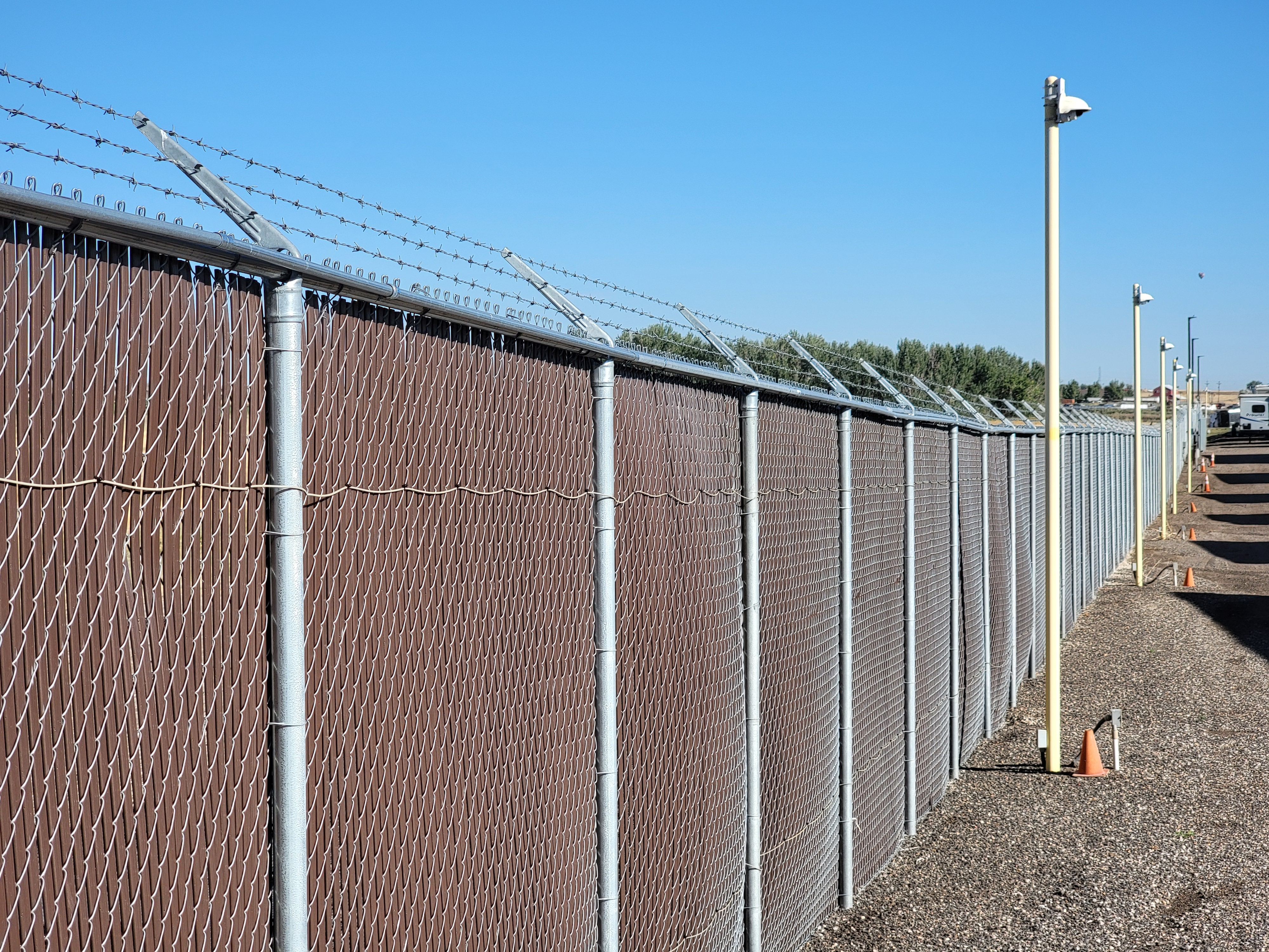 Protected fence lines with motion sensors and anti-climb/cut technology in Erie, CO