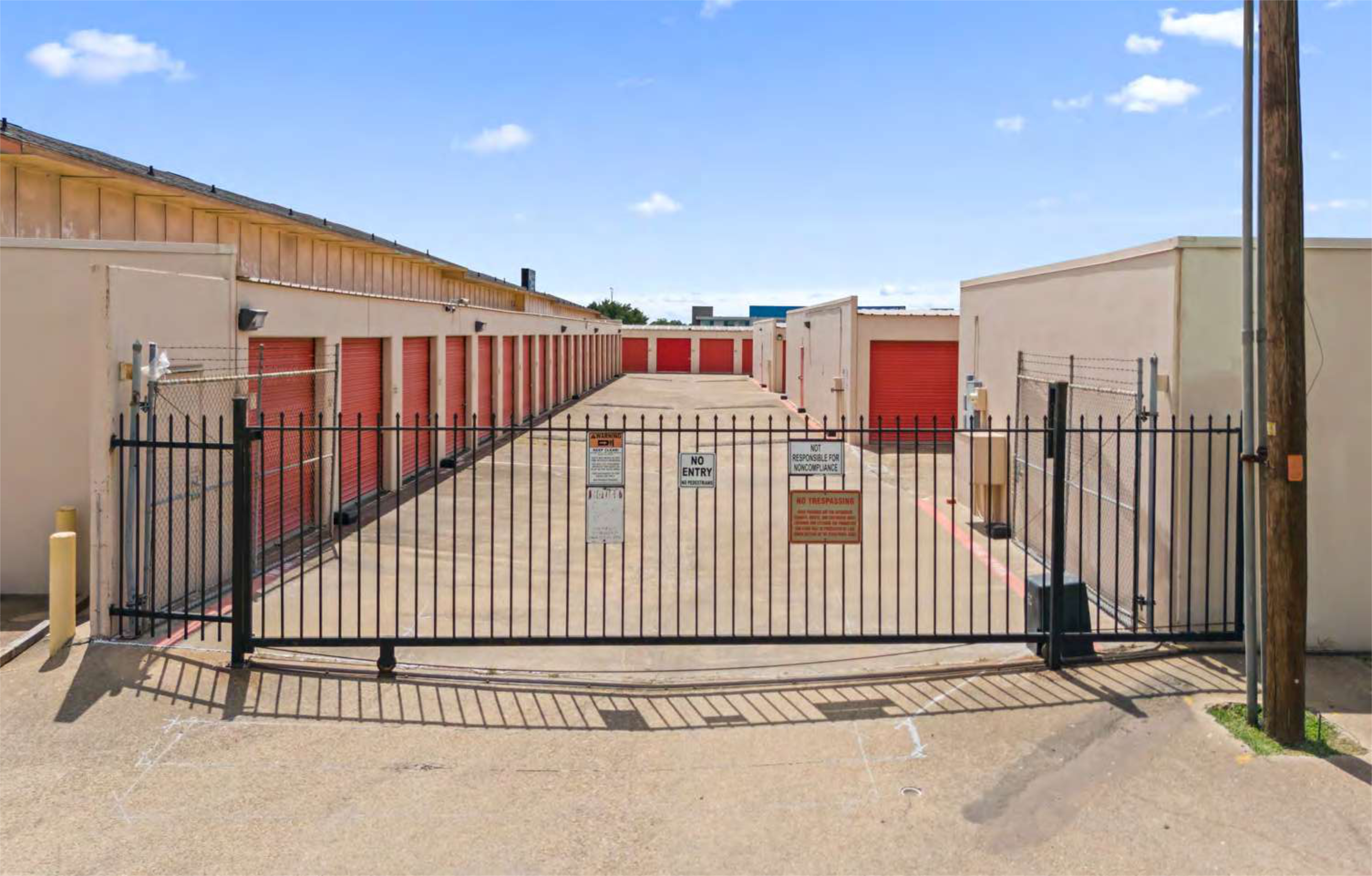 Gated self storage facility near Rockwall TX with drive-up units and covered parking