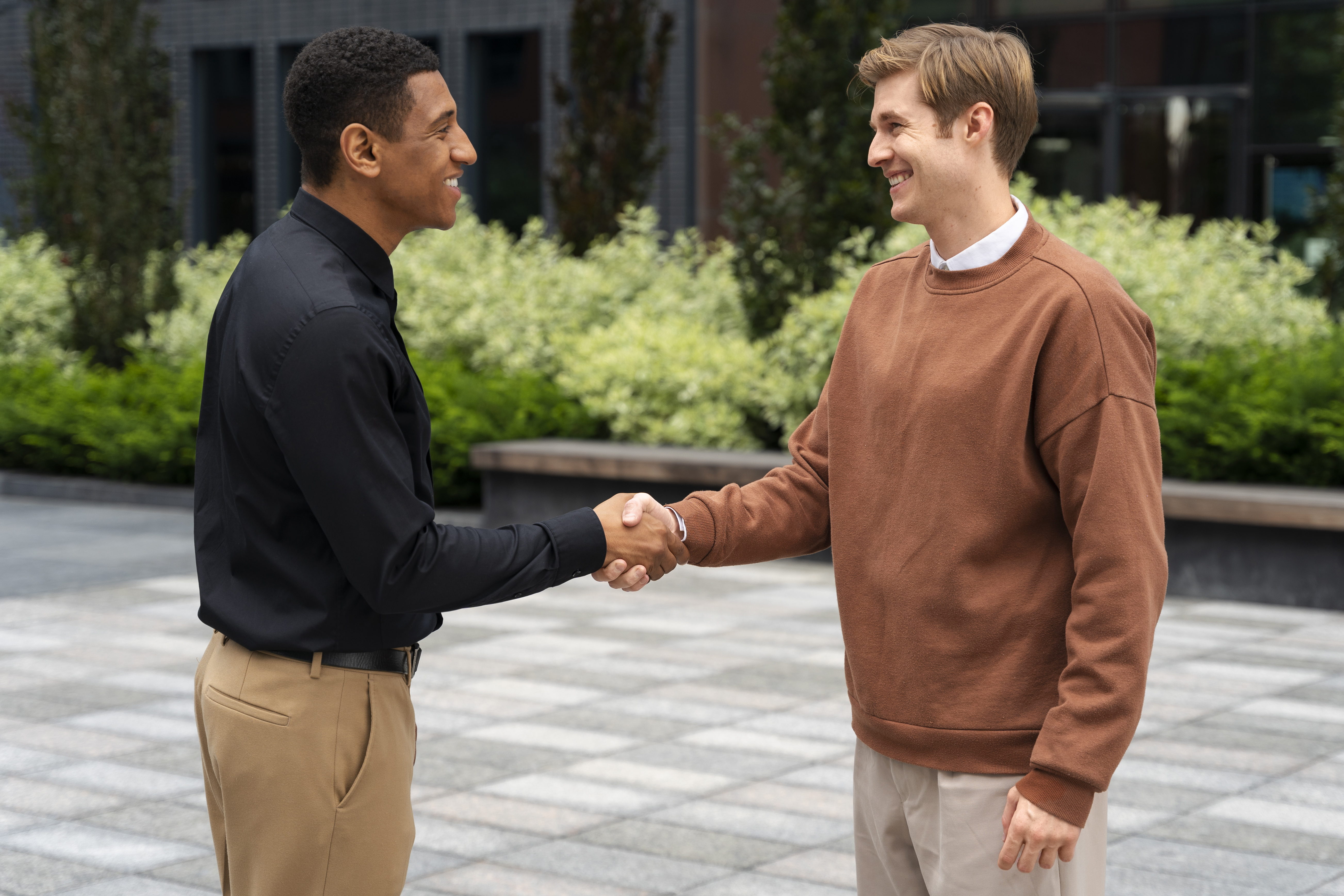 Two people shaking hands representing a referral and loyalty discount program at a storage facility in Waxahachie, TX