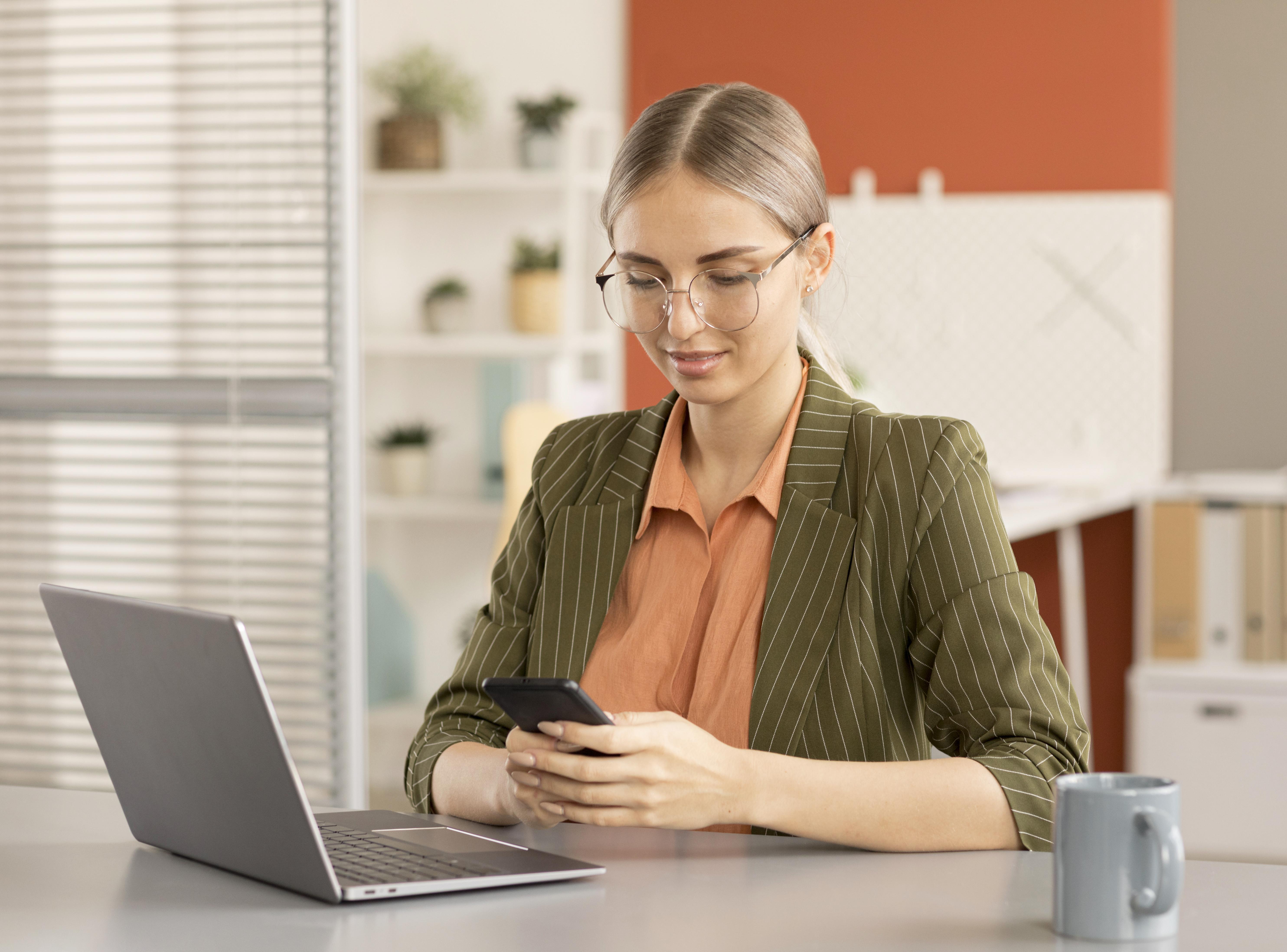Online Storage Booking Galveston, TX Bayside Galveston resident using online storage booking to reserve a self-storage unit on a smartphone