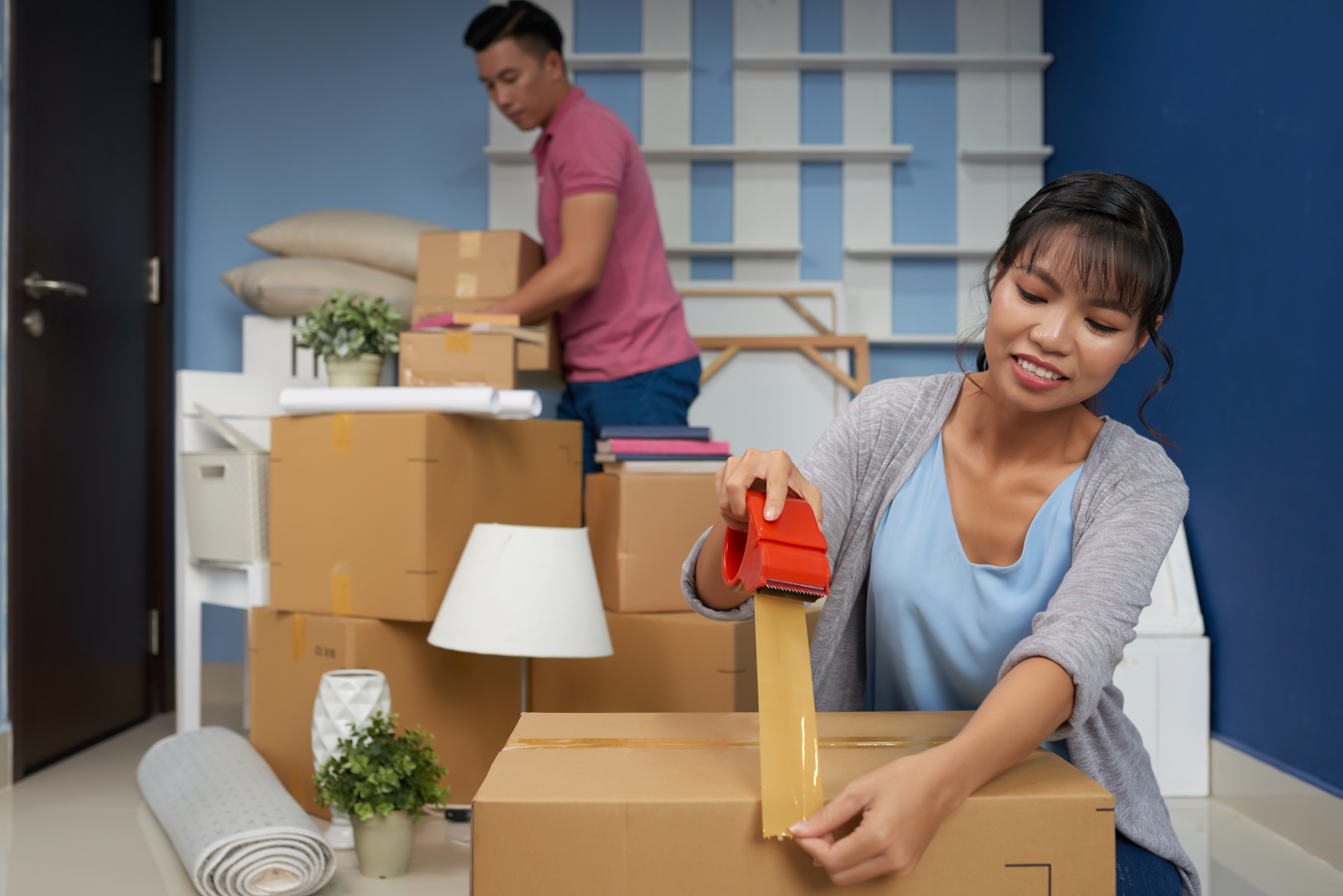 Bridge Storage Between Homes Moving Guide Couple managing bridge storage between homes during a Royse City, Texas, real estate transition