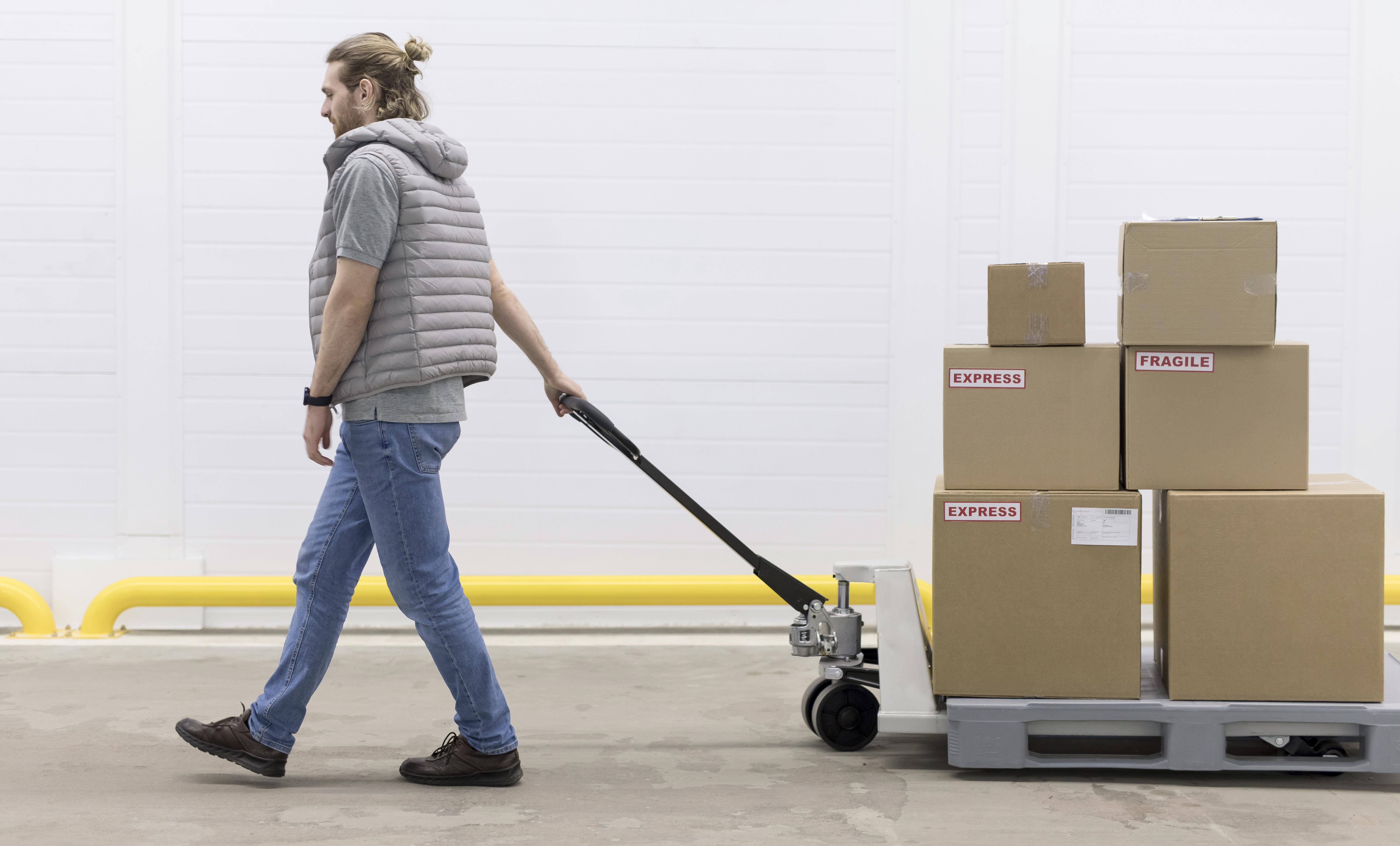  Galveston business owner loading inventory into a drive-up off-site storage unit