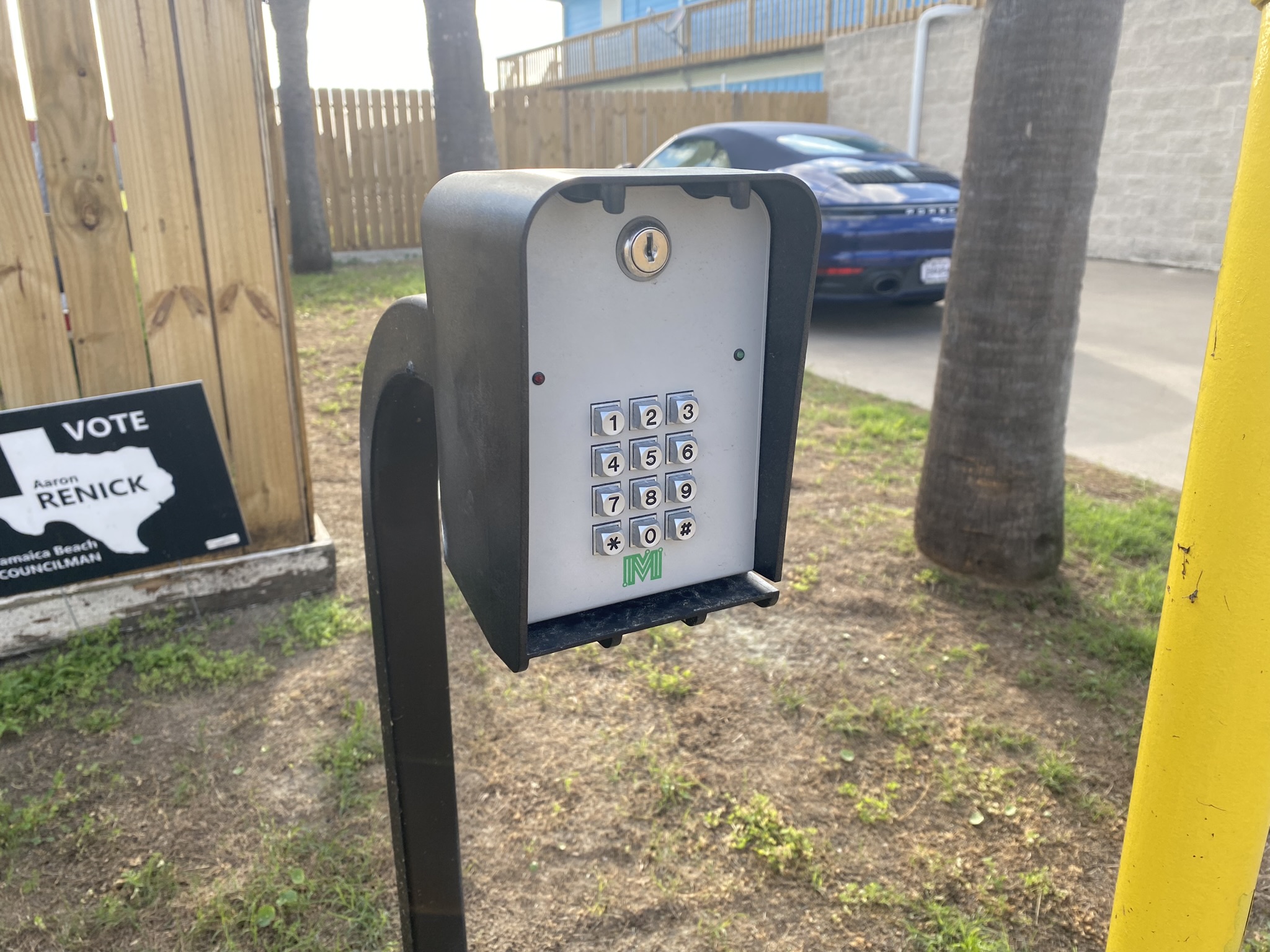 Secure keypad gate access at Bayside Storage in Galveston, TX, providing Pirates Beach residents with safe entry for beach and outdoor gear storage
