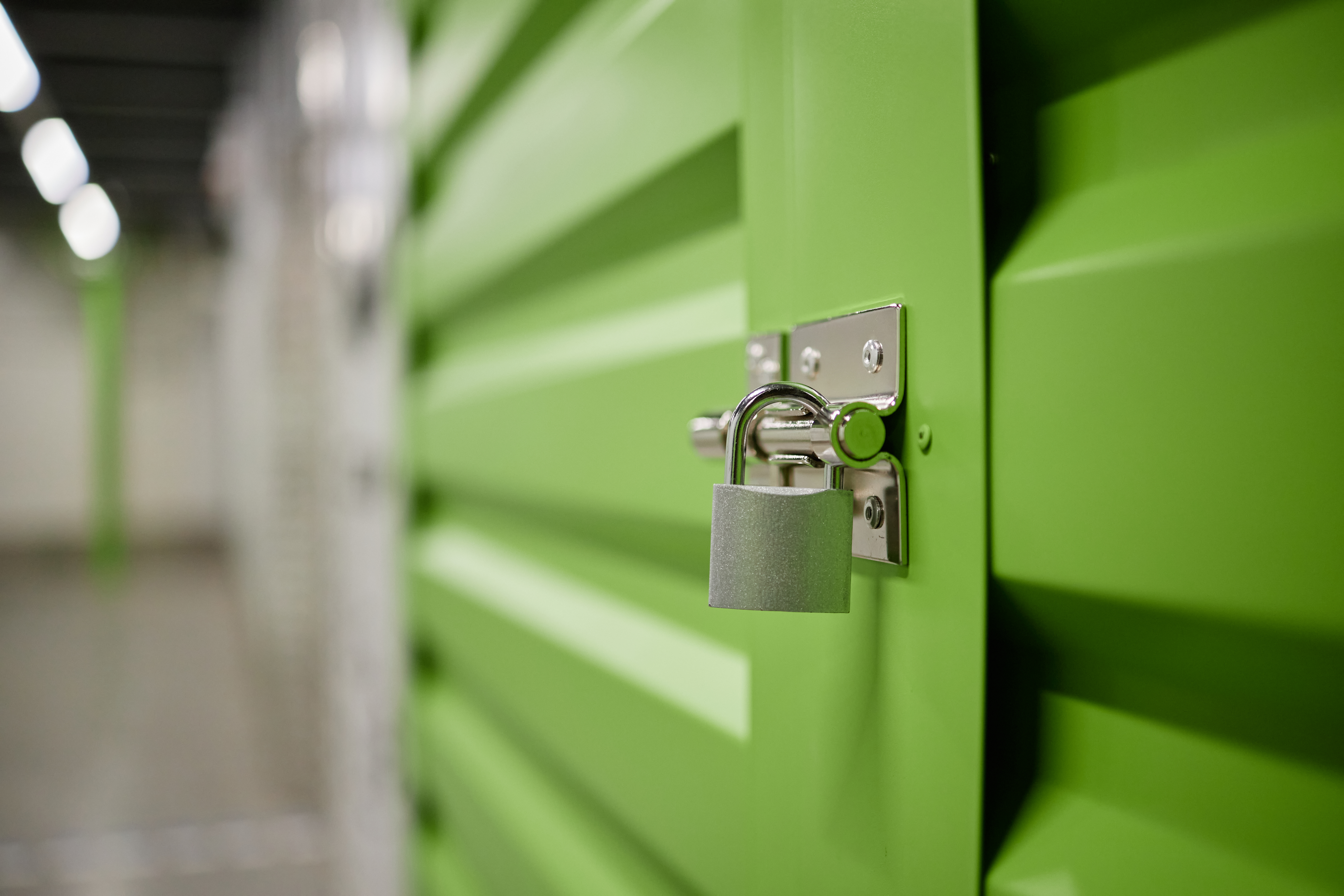  Disc lock securing a storage unit door latch — how to properly lock and secure a storage unit in Athens, TX