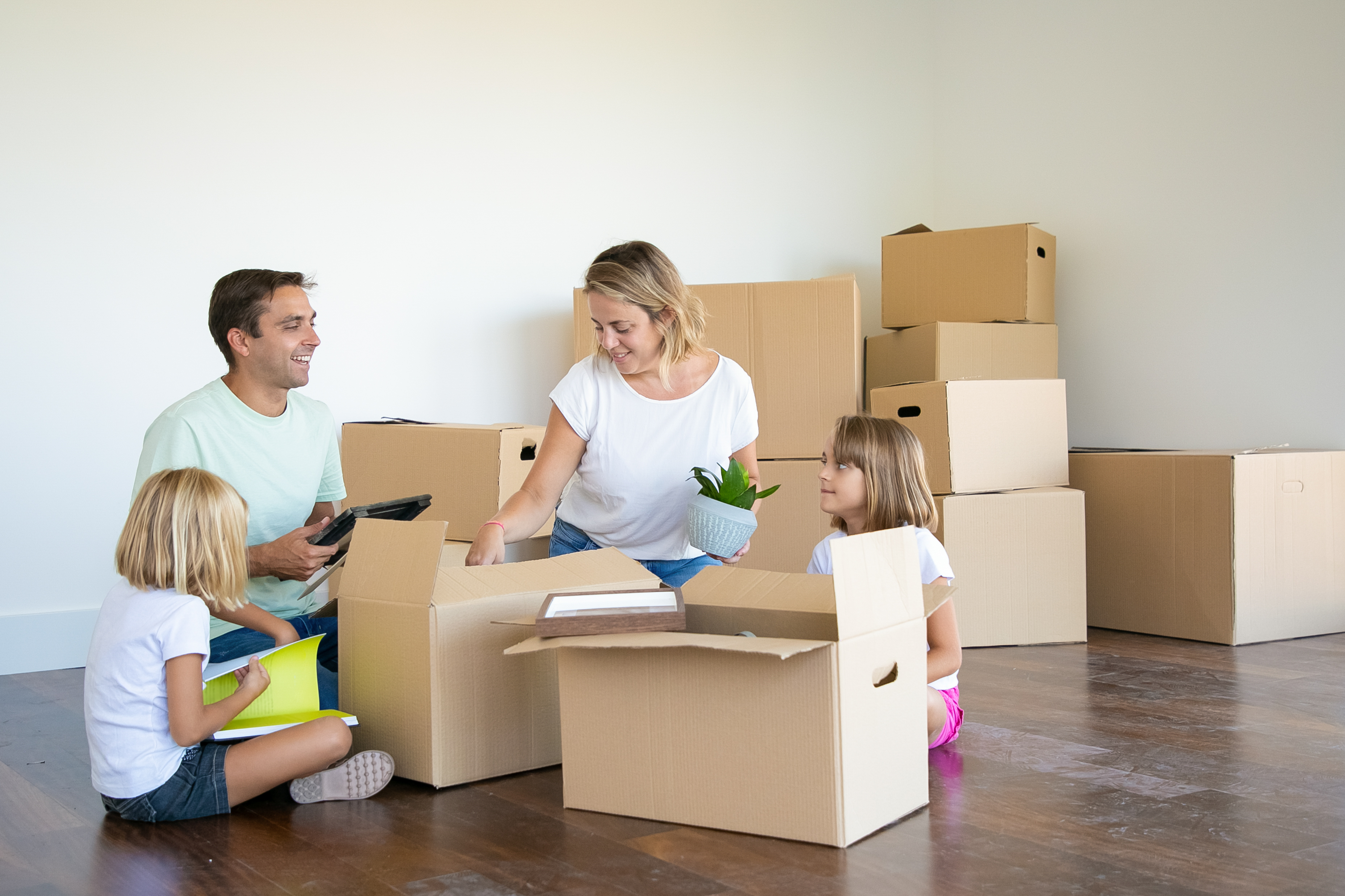 Affordable Self Storage Mustang Ridge, TX Renters Renter enjoying a clean, organized apartment after using affordable self-storage near Mustang Ridge, TX