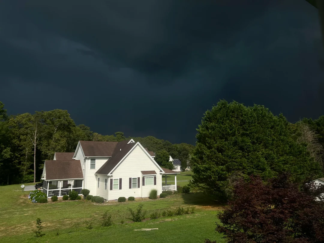  Dark storm clouds over a Central Texas rural community near Dale TX with secure storage protection