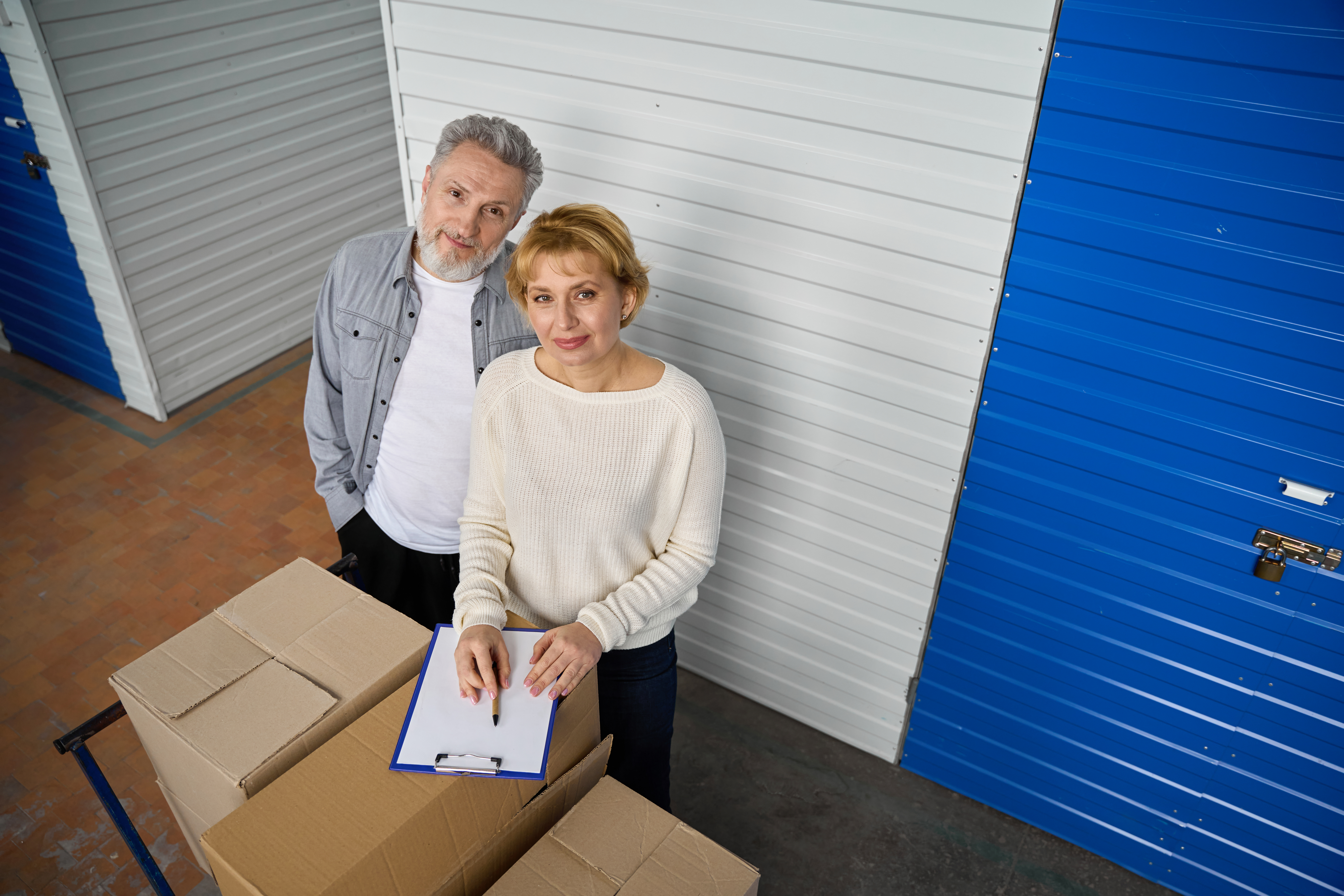 Tenant reviewing storage unit insurance policy options at a Texas self-storage facility