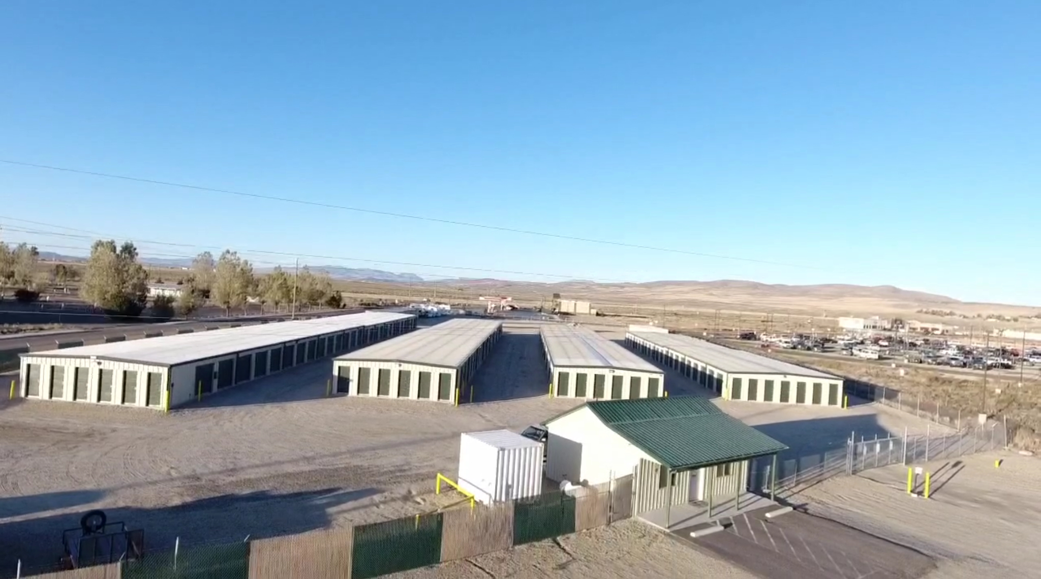 aeriel view of Spring Creek Self Storage. fenced and gated facility with multiple storage units