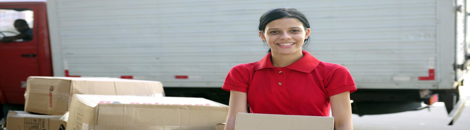 Downtown Self Storage girl holding box