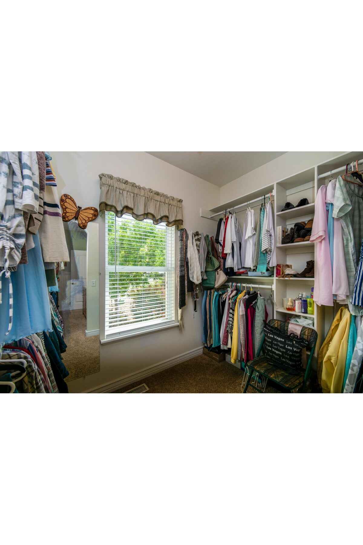 A closet filled with clothes for storage in Midwest City