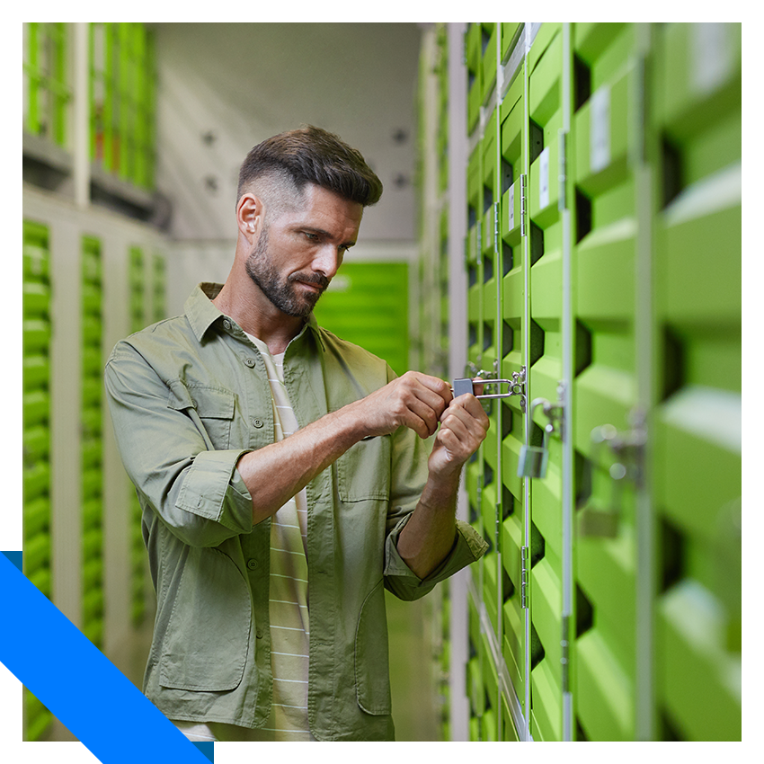 Man unlocking his secure storage unit