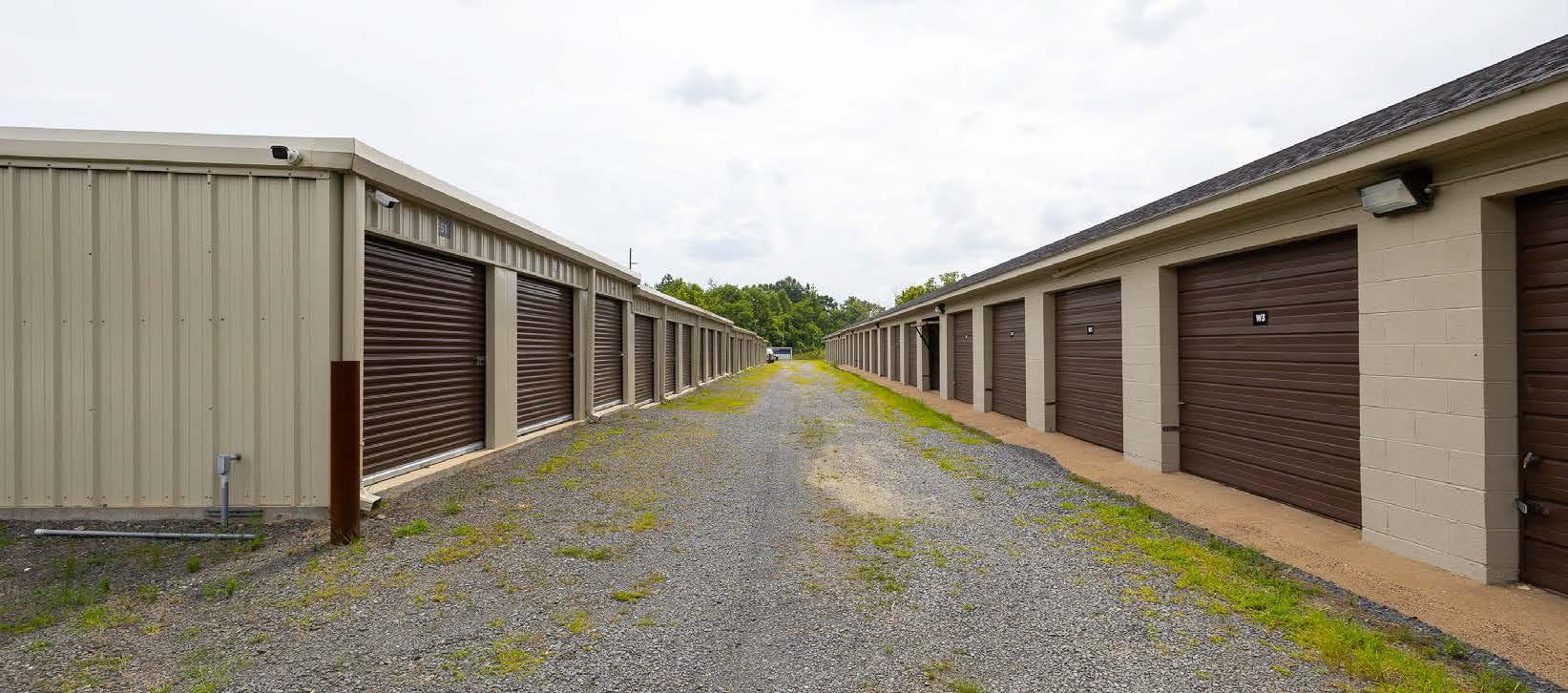 Fenced & Lighted Facility with Drive-Up Units and Tractor Trailer ...