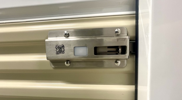 sliding latch on a self storage unit door