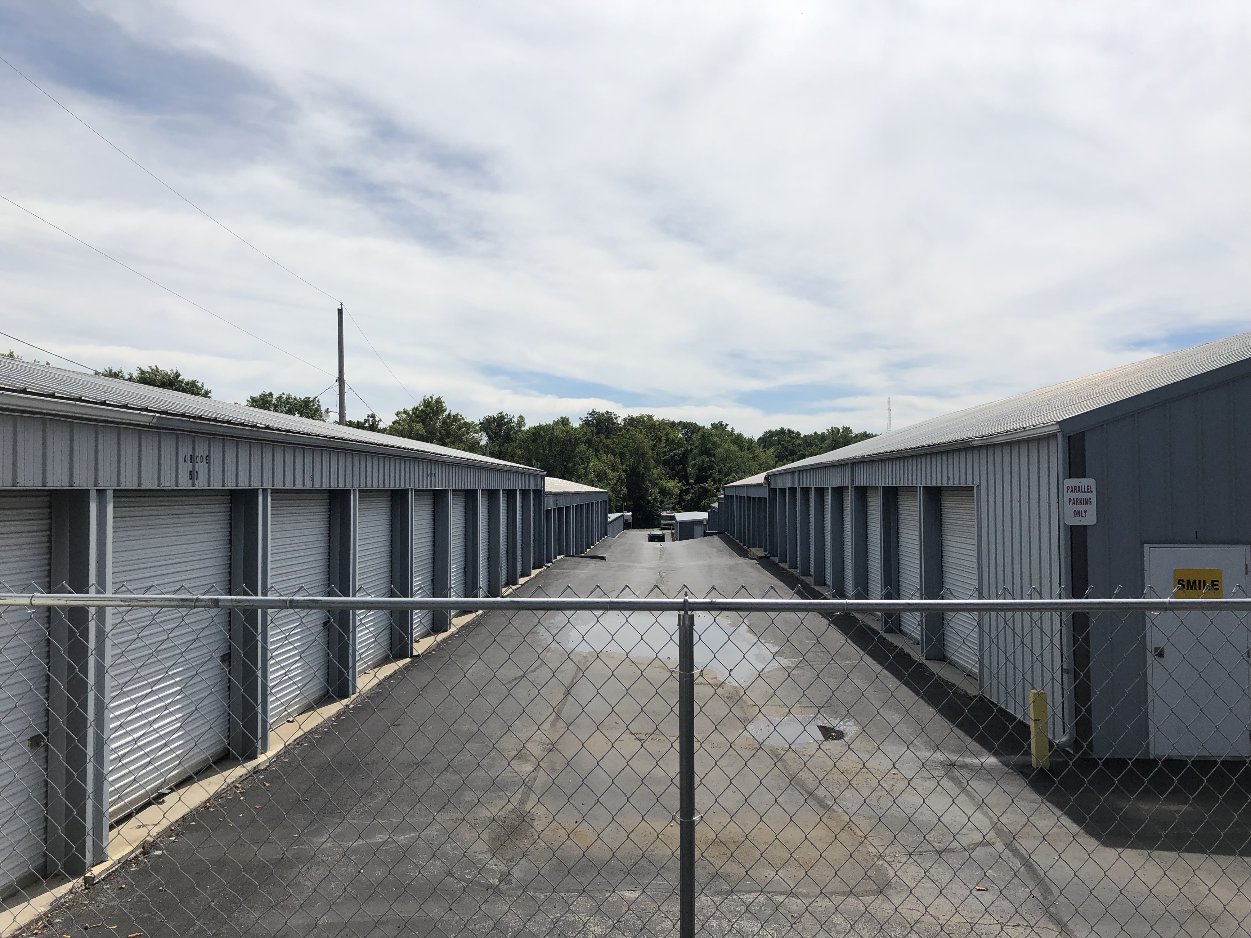 Storage buildings behind perimeter fence