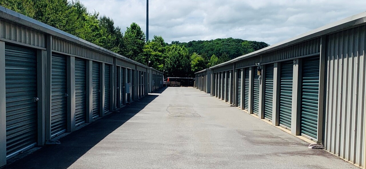 two buildings of self storage units with drive up access
