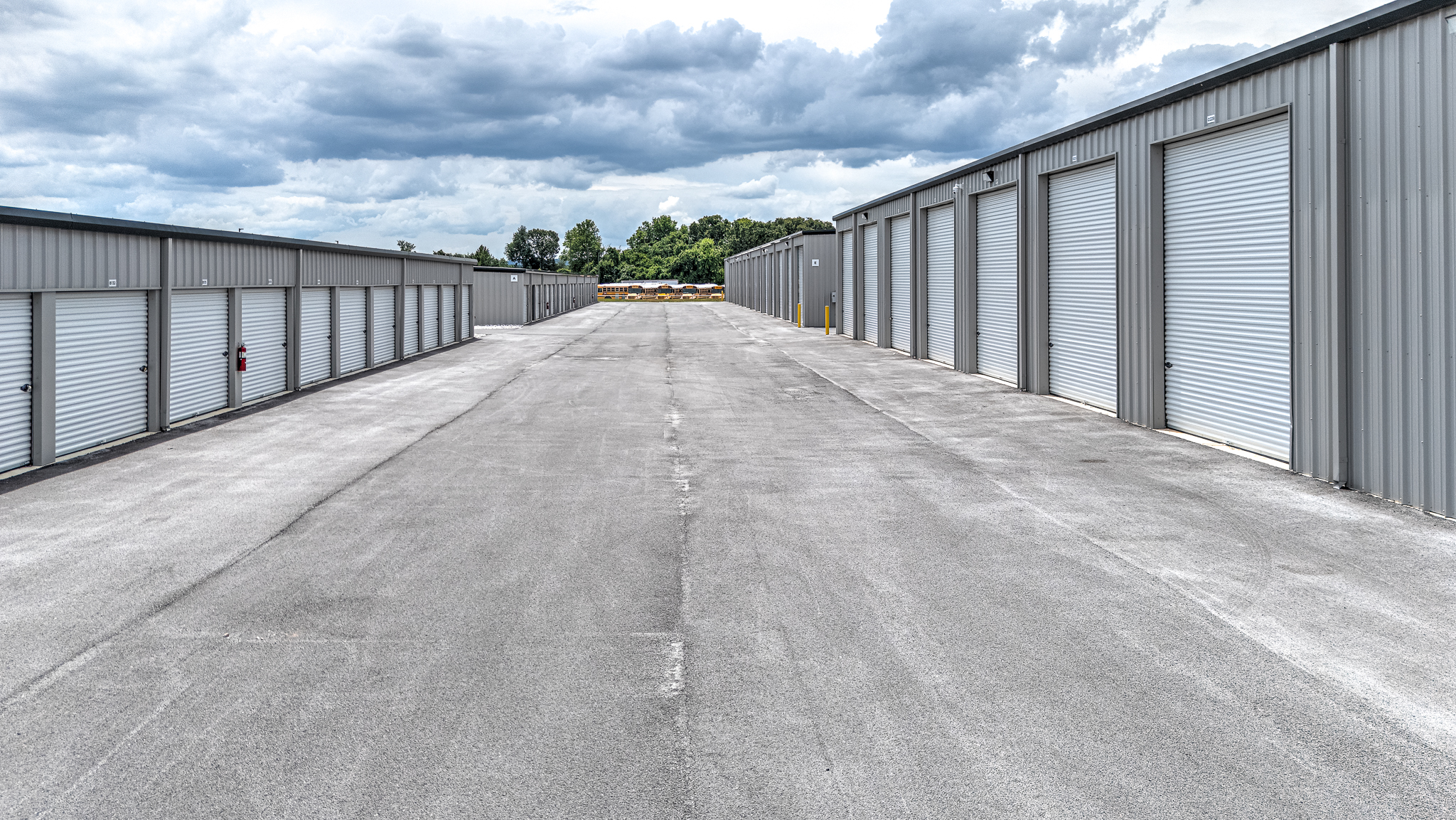 Artifacts Self Storage wide drive aisle to enclosed RV and boat storage