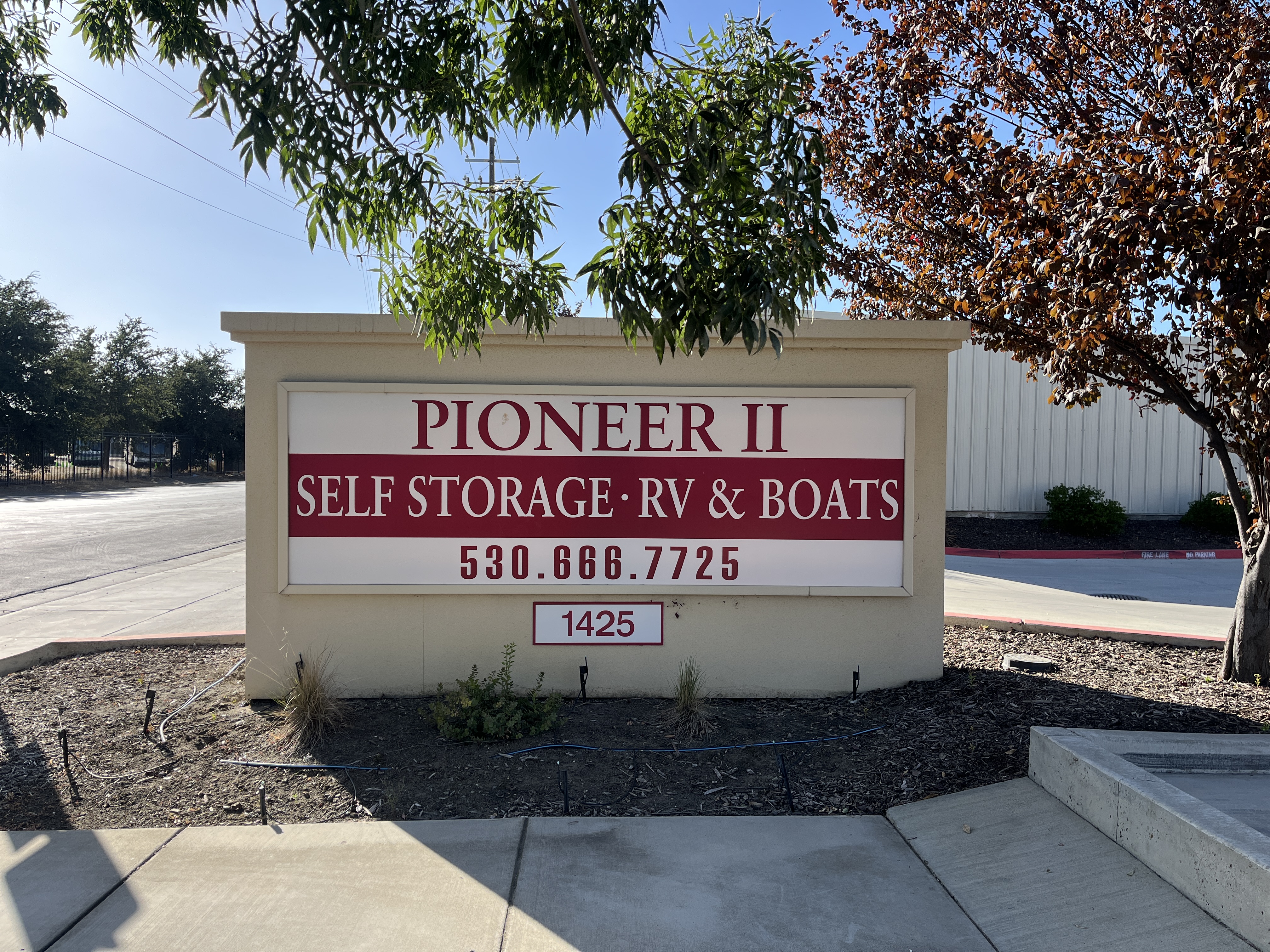 Sign features Pioneer Self Storage 2 RV and Boat Storage with contact information (530) 666-7725
