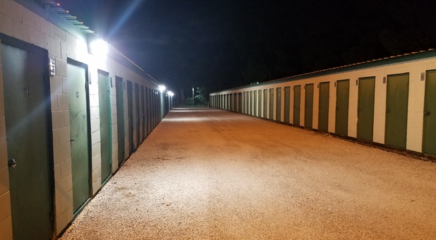 Lighted rows of self storage units at Stow Stuff Storage