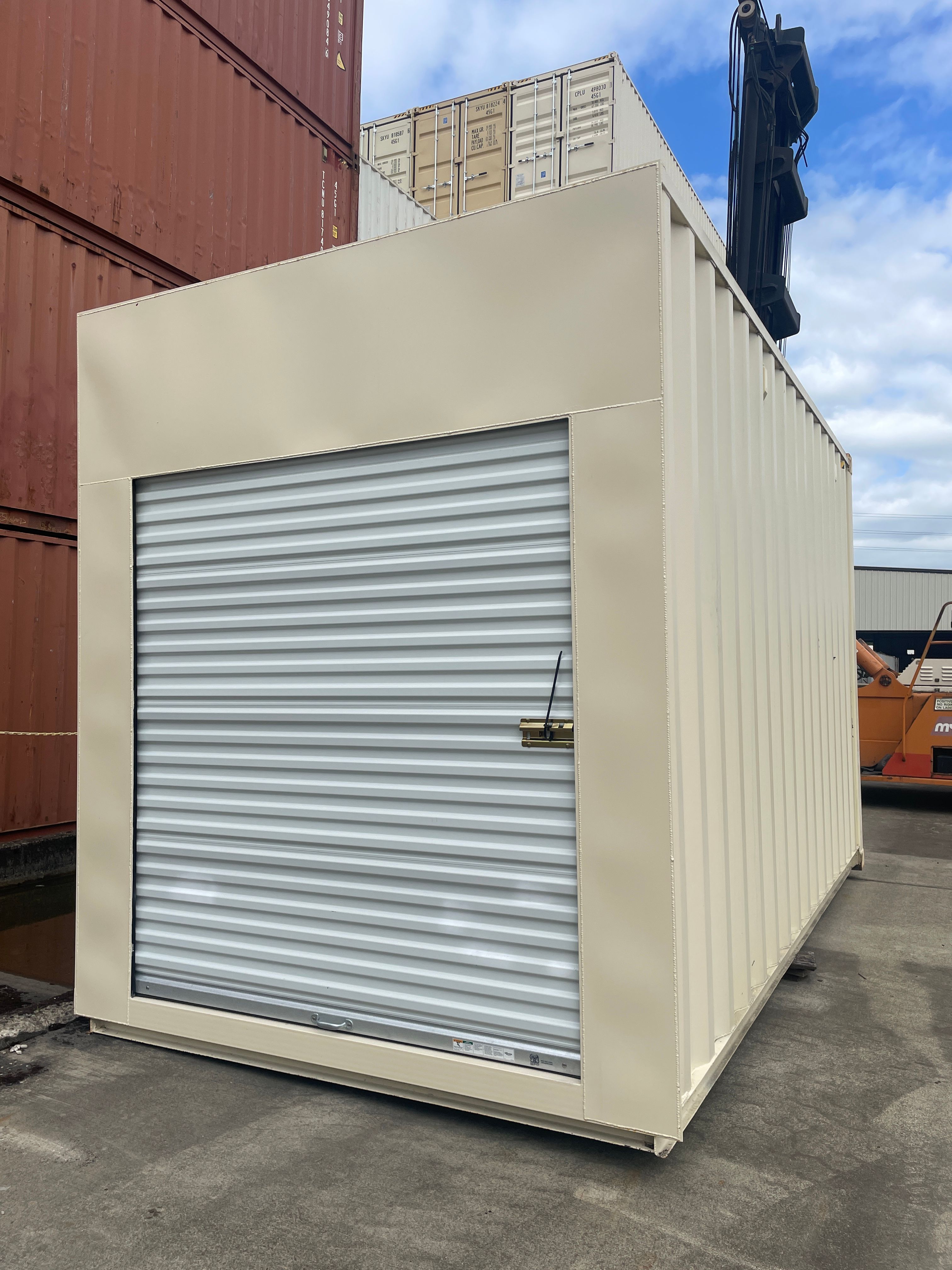 shipping container with roll-up door