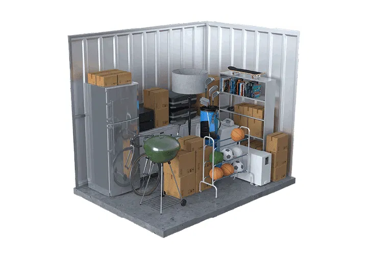 5x10 storage unit holding a refrigerator, bicycle, grill, shelving, and boxes