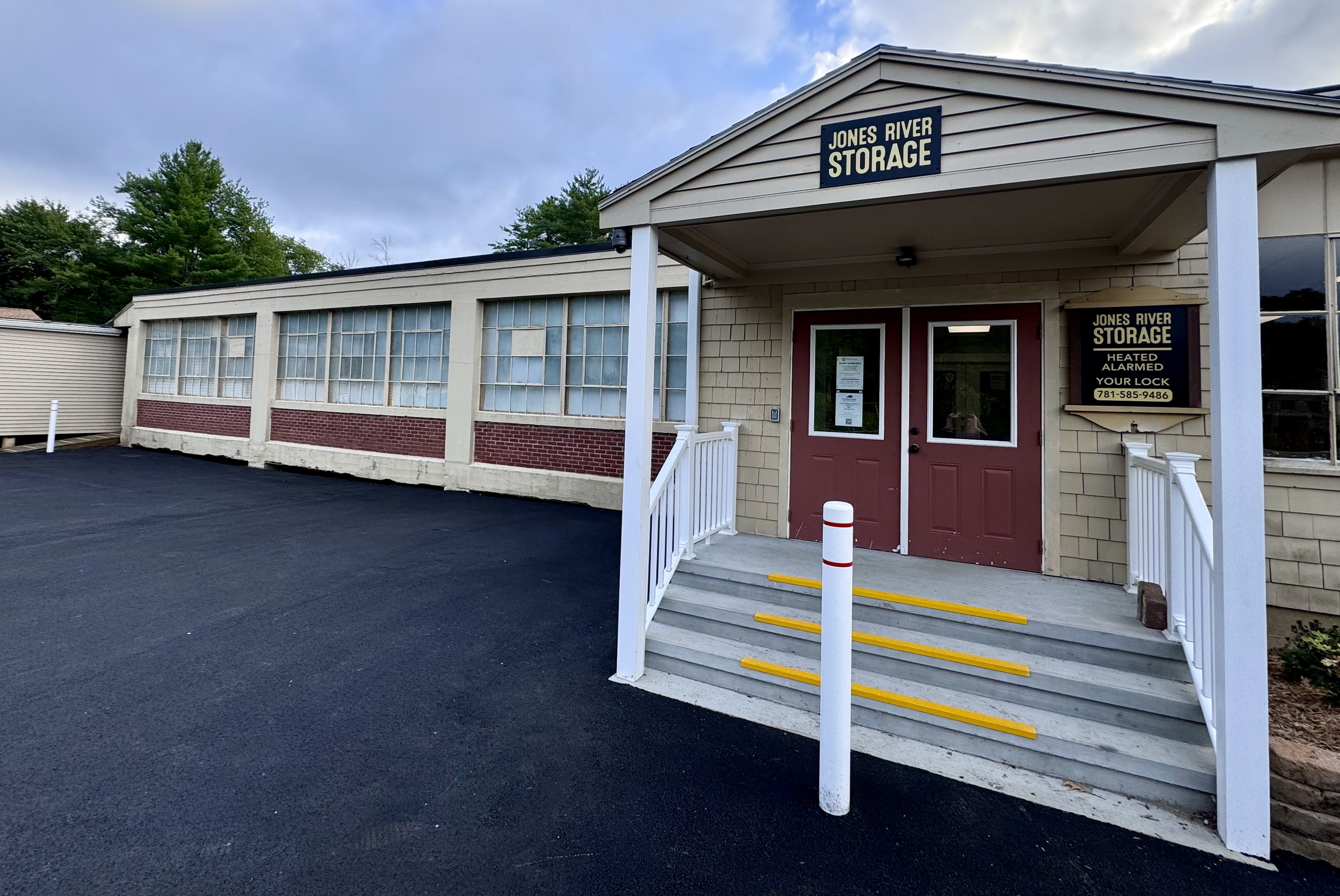 Front facade of Jones River Storage facility, featuring secure, gated access and well-maintained exterior for a welcoming, professional appearance.