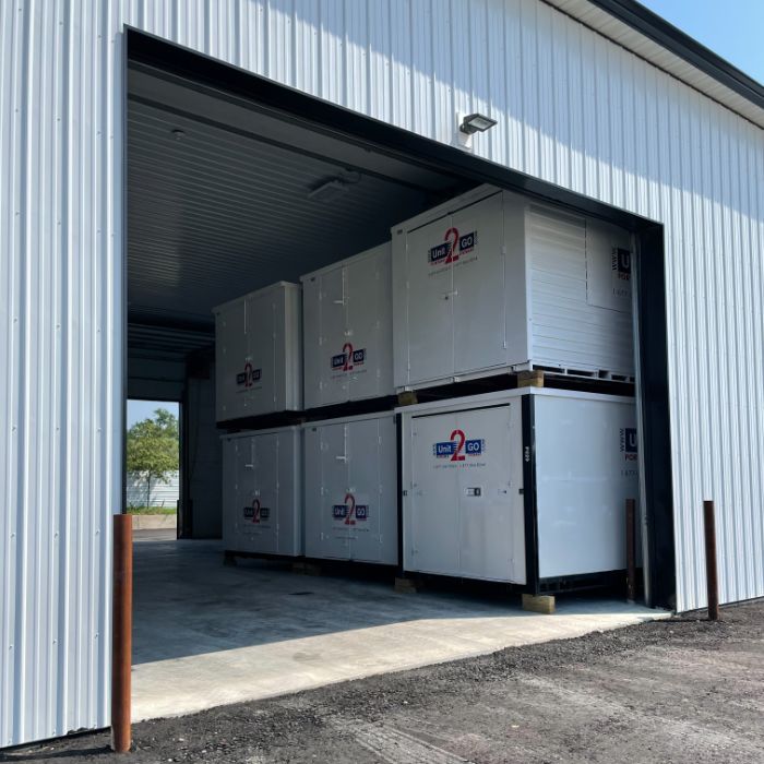 portable storage units inside a large warehouse
