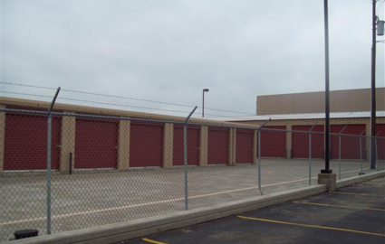 drive up access storage units in a fenced storage facility