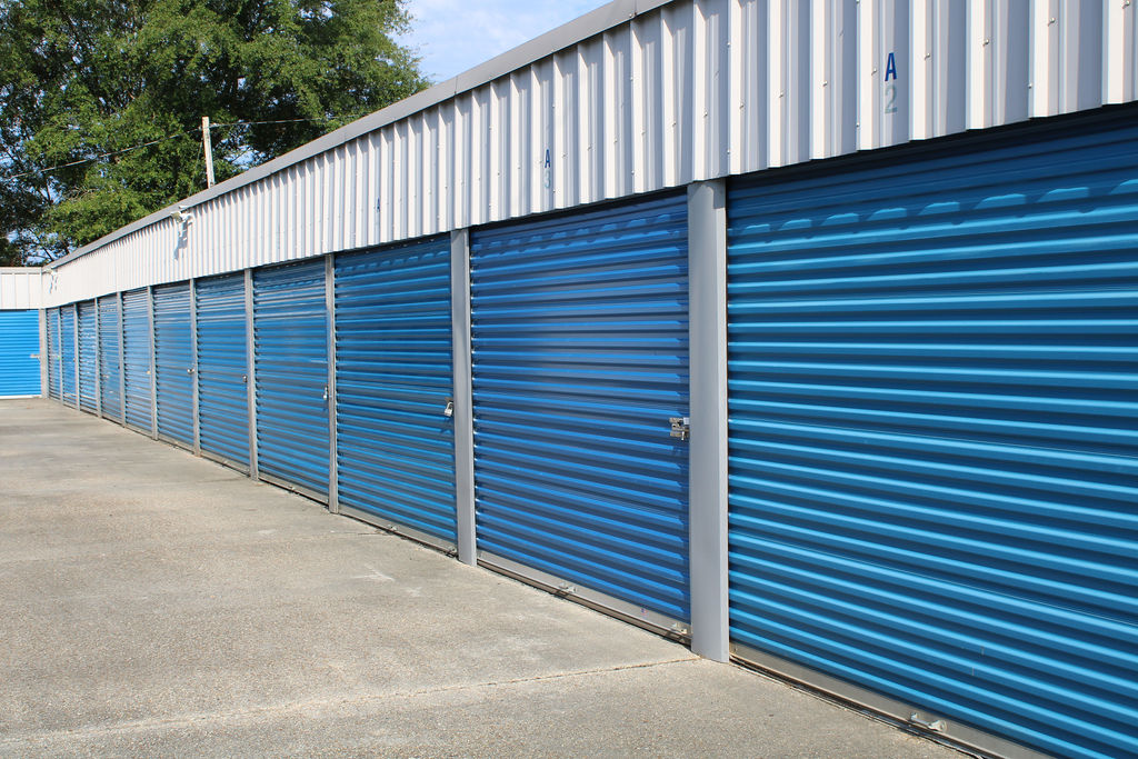 Row of blue storage units of uniform size
