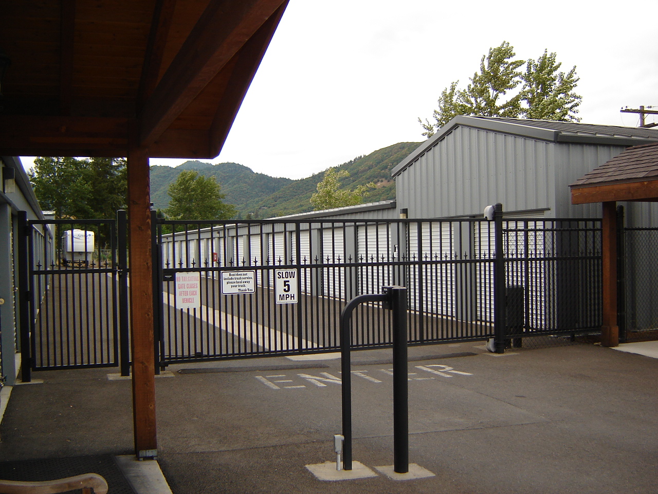 Gated entrance with keypad at Parkway Mini Storage