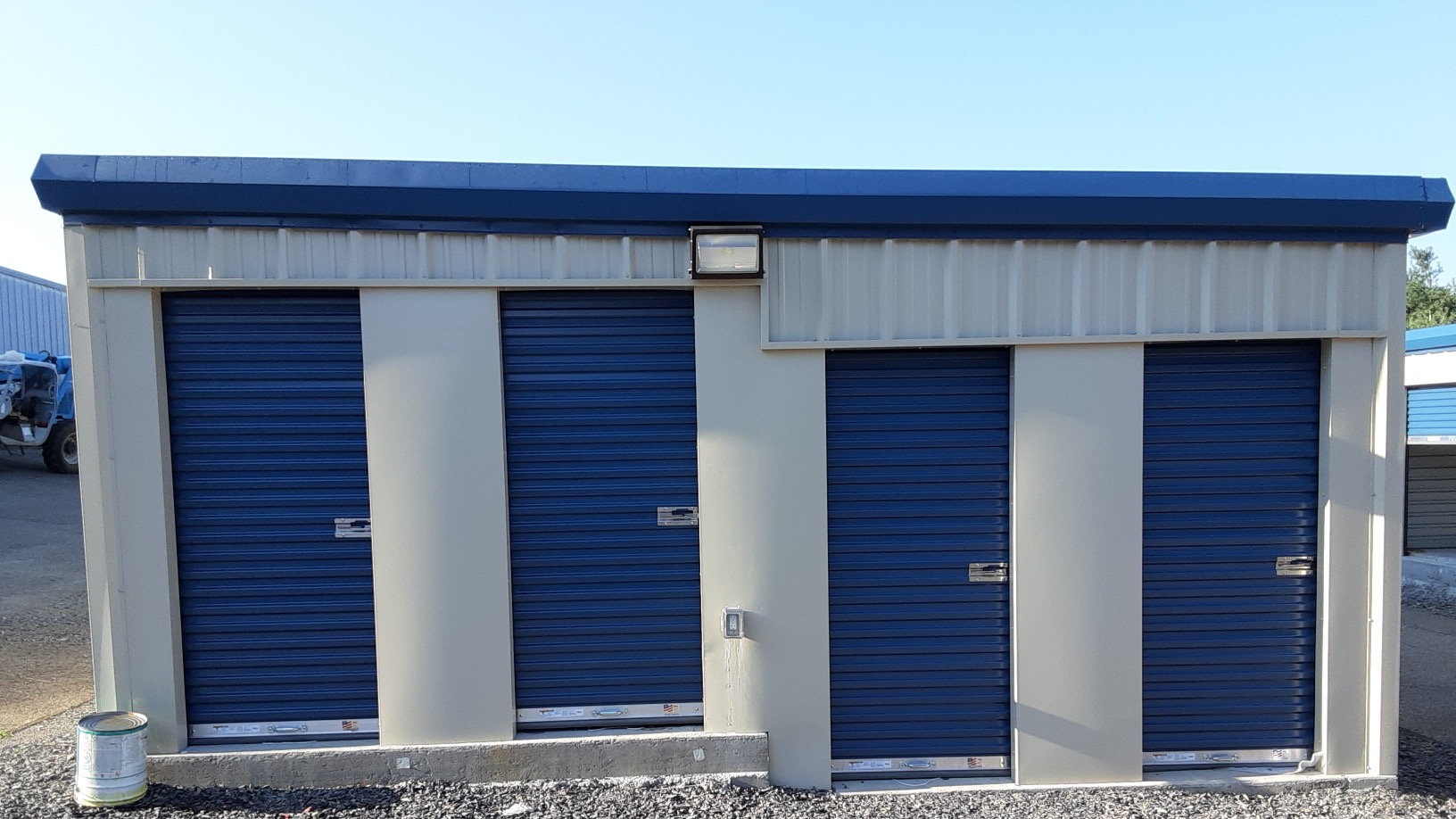 Outdoor storage units with exterior access doors