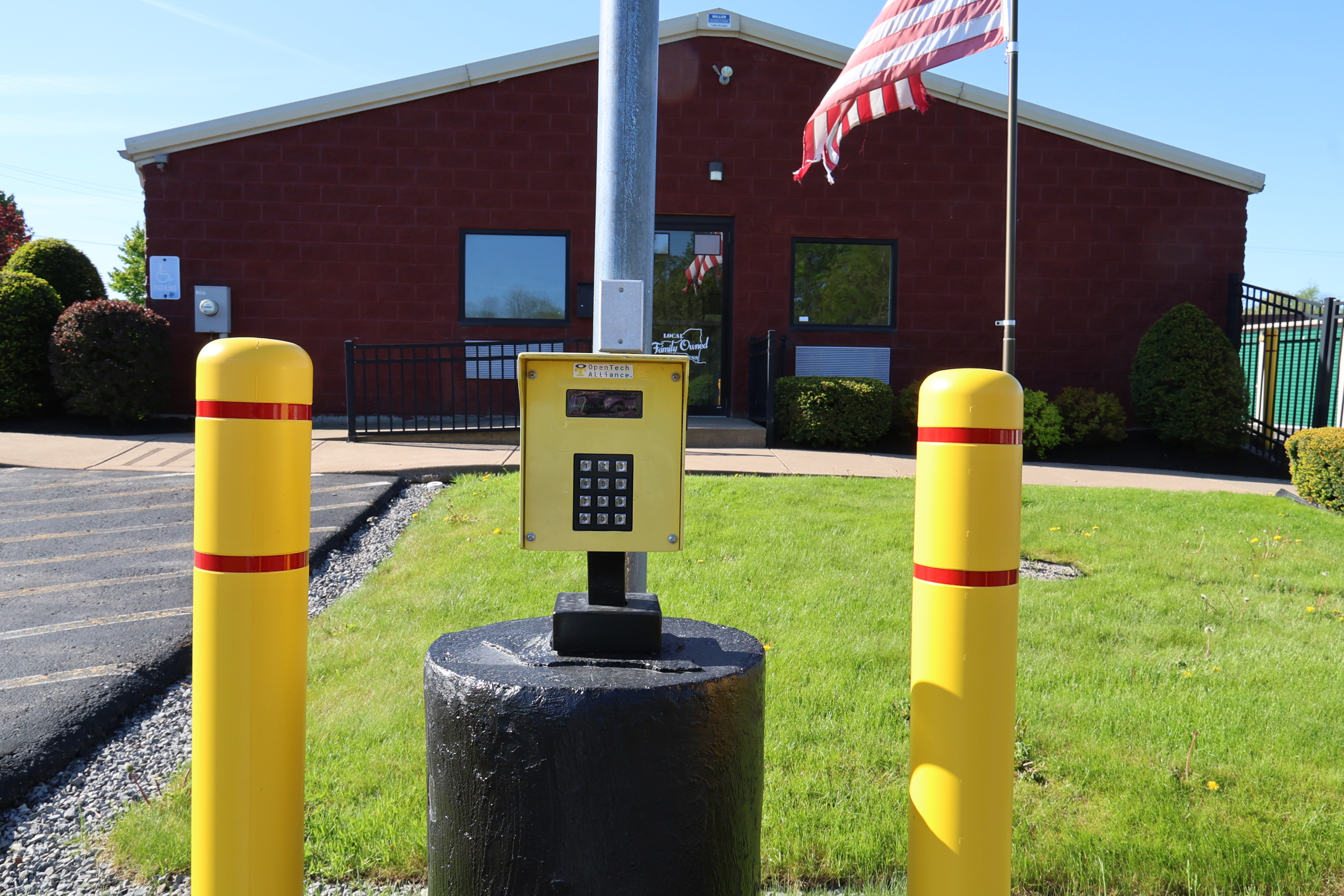 Keypad access system at A-Verdi Self Storage Baldwinsville in front of the office building with secure controlled entry