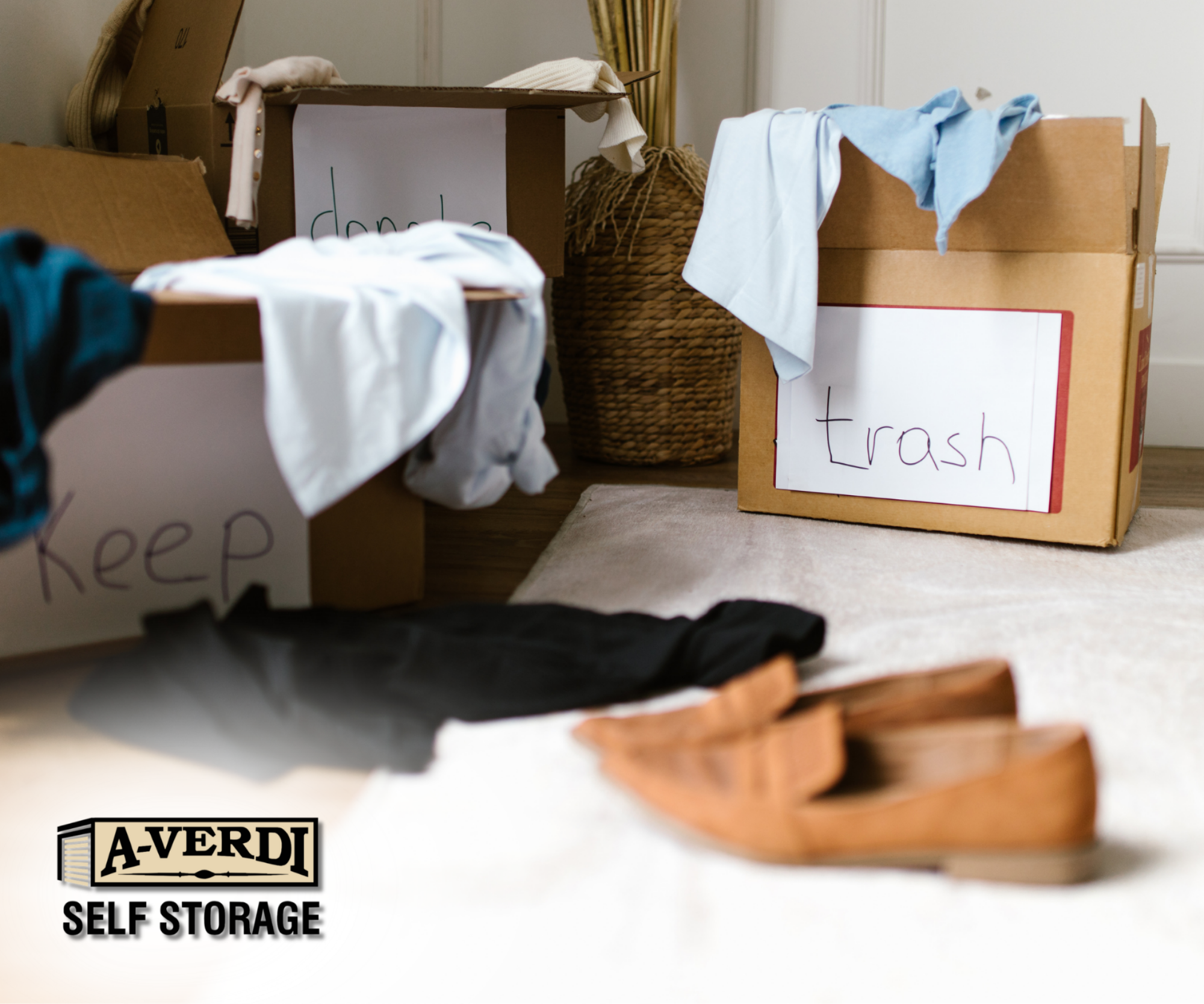 Decluttering scene with labeled boxes for keep, donate, and trash, clothes sorting on floor, and A-Verdi Self Storage branding visible—organized home cleanout and storage preparation concept