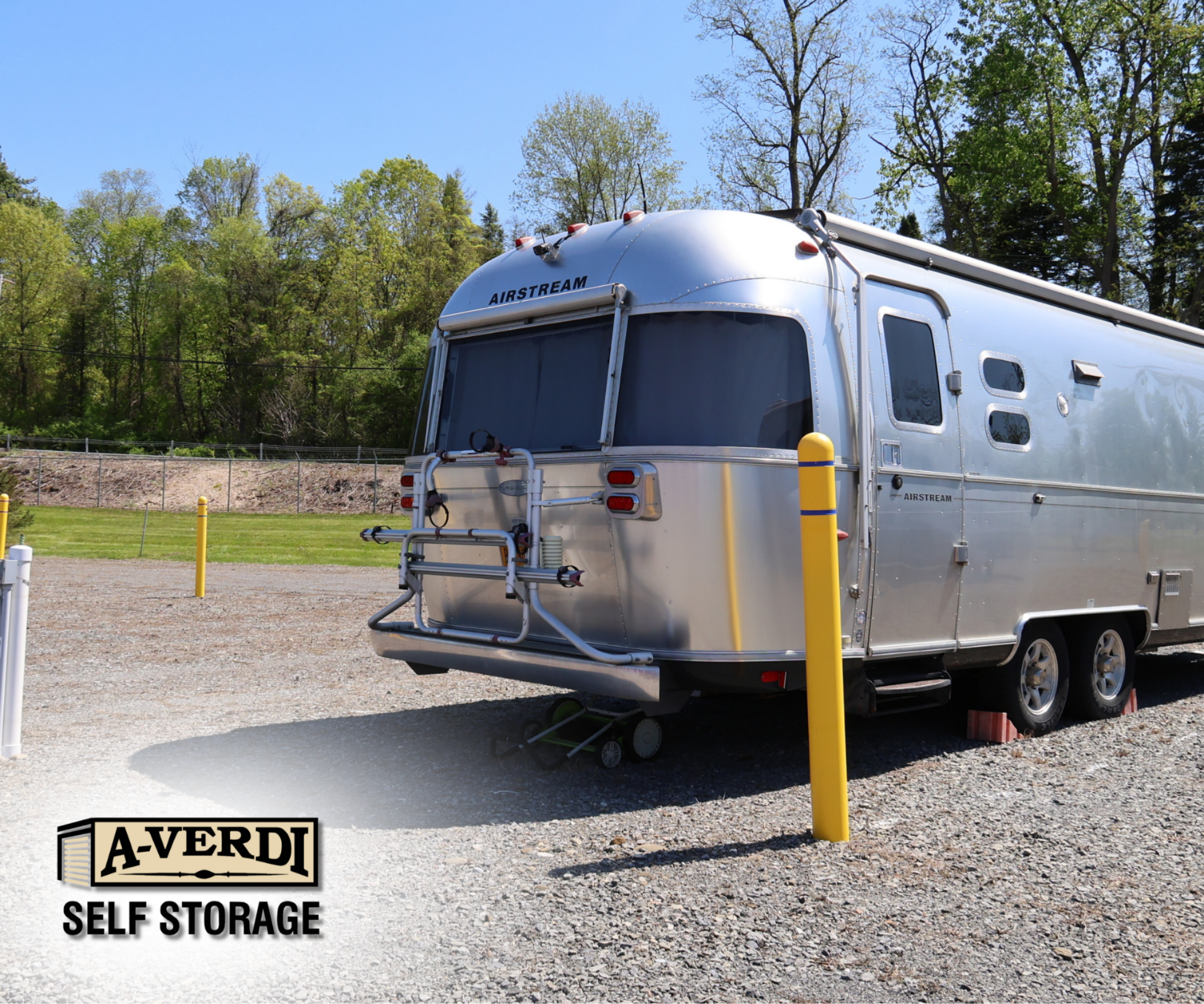 Transitioning Your Vehicle Out of Winter Storage: What to Check Before You Hit the Road silver Airstream camper trailer stored at an A-Verdi Self Storage facility
