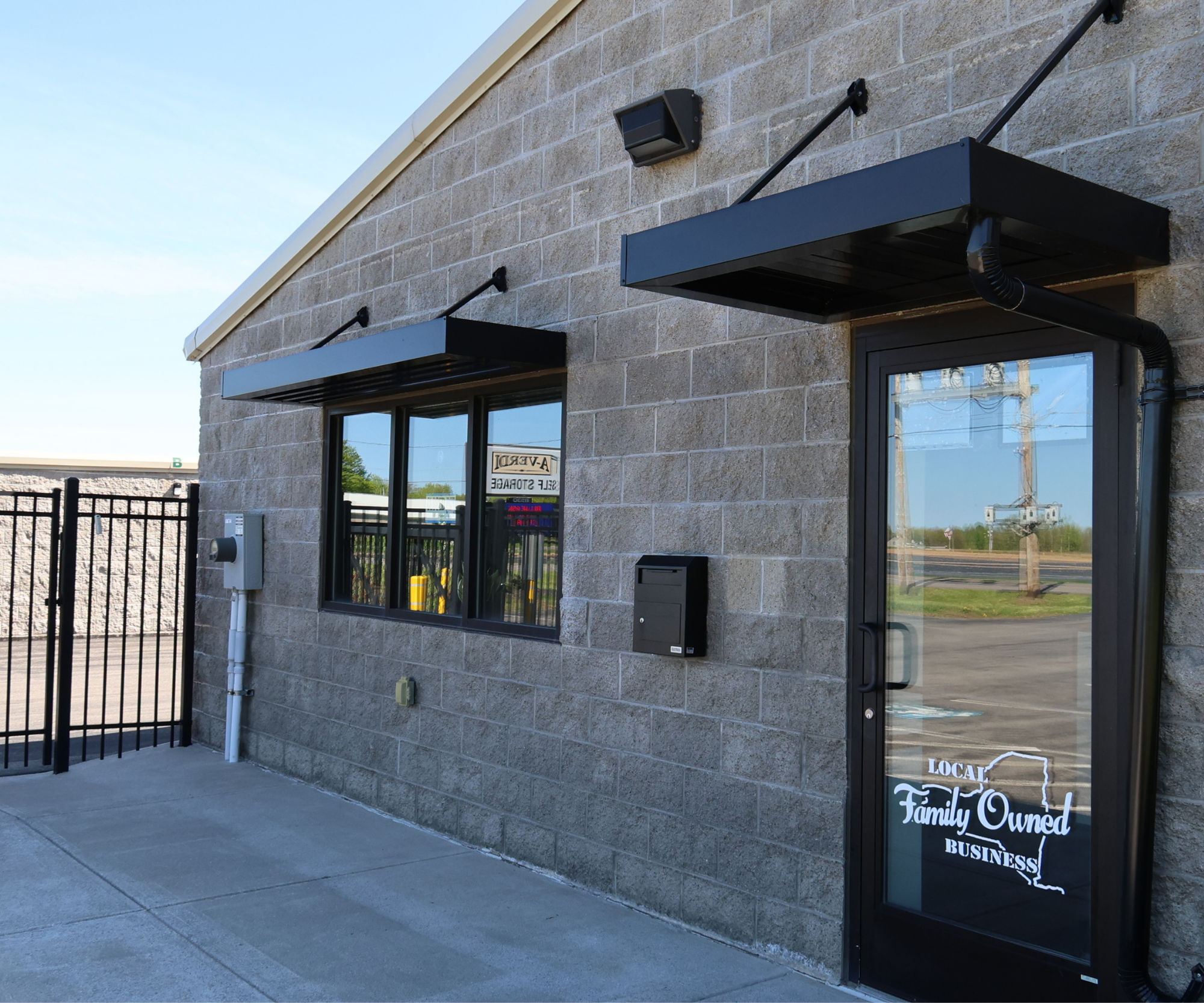 Spring Inventory Management for Retailers: Create Space, Improve Flow, and Prepare for Growth exterior view of an A-Verdi Self Storage facility office entrance