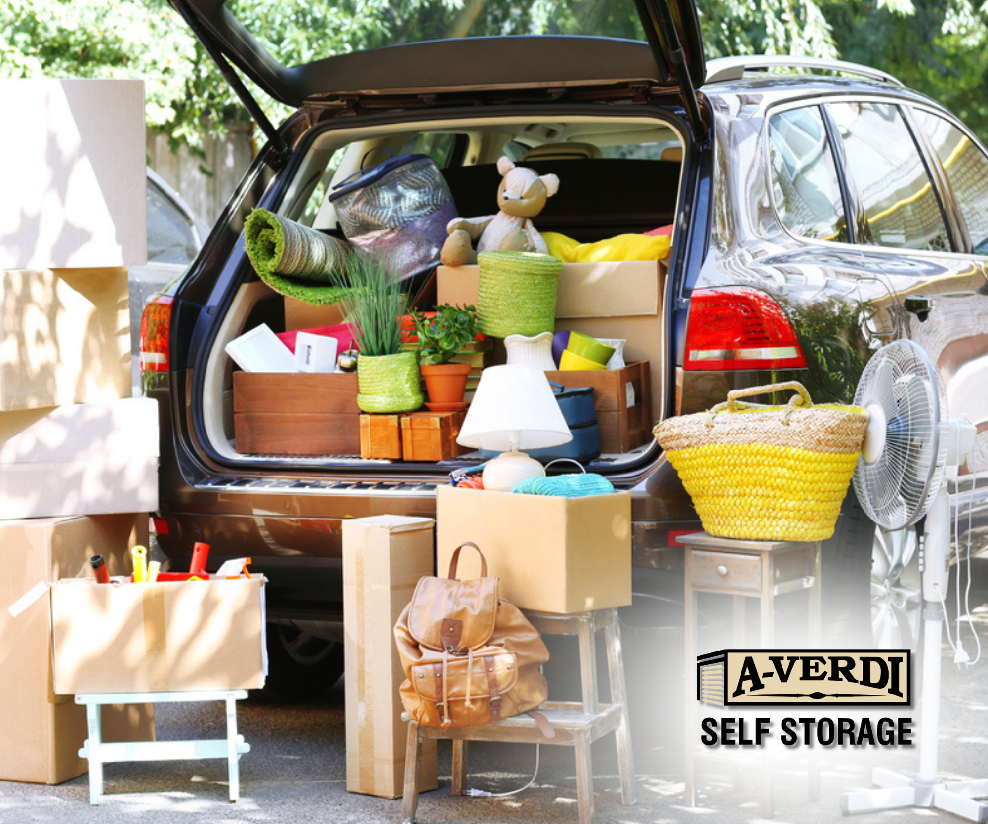 Summer Moves: How Storage Makes Relocation Easier (and Less Stressful) an open SUV trunk with household items indicating moving