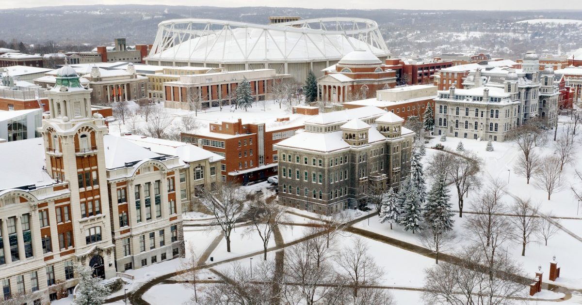 Snow-covered Syracuse University campus in winter, representing Syracuse students using self storage during winter break to store dorm room belongings safely and conveniently.