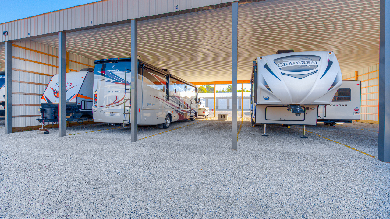 A row of covered parking spaces at Hawkeye Storage, perfect for RVs and campers.