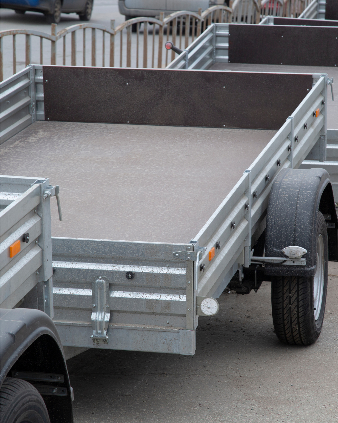 Empty utility trailer in secure valet trailer storage at Delta RV & Boat Storage