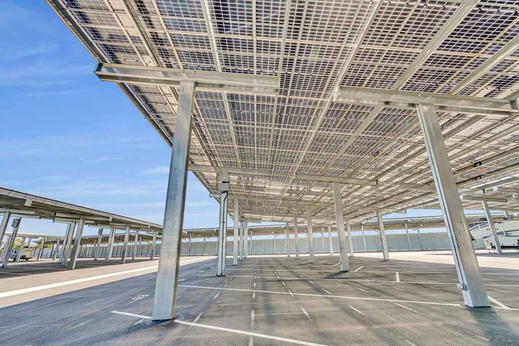 Solar-powered covered parking at LuxeGuard RV and Boat Storage in Pittsburg, CA for RVs and boats.